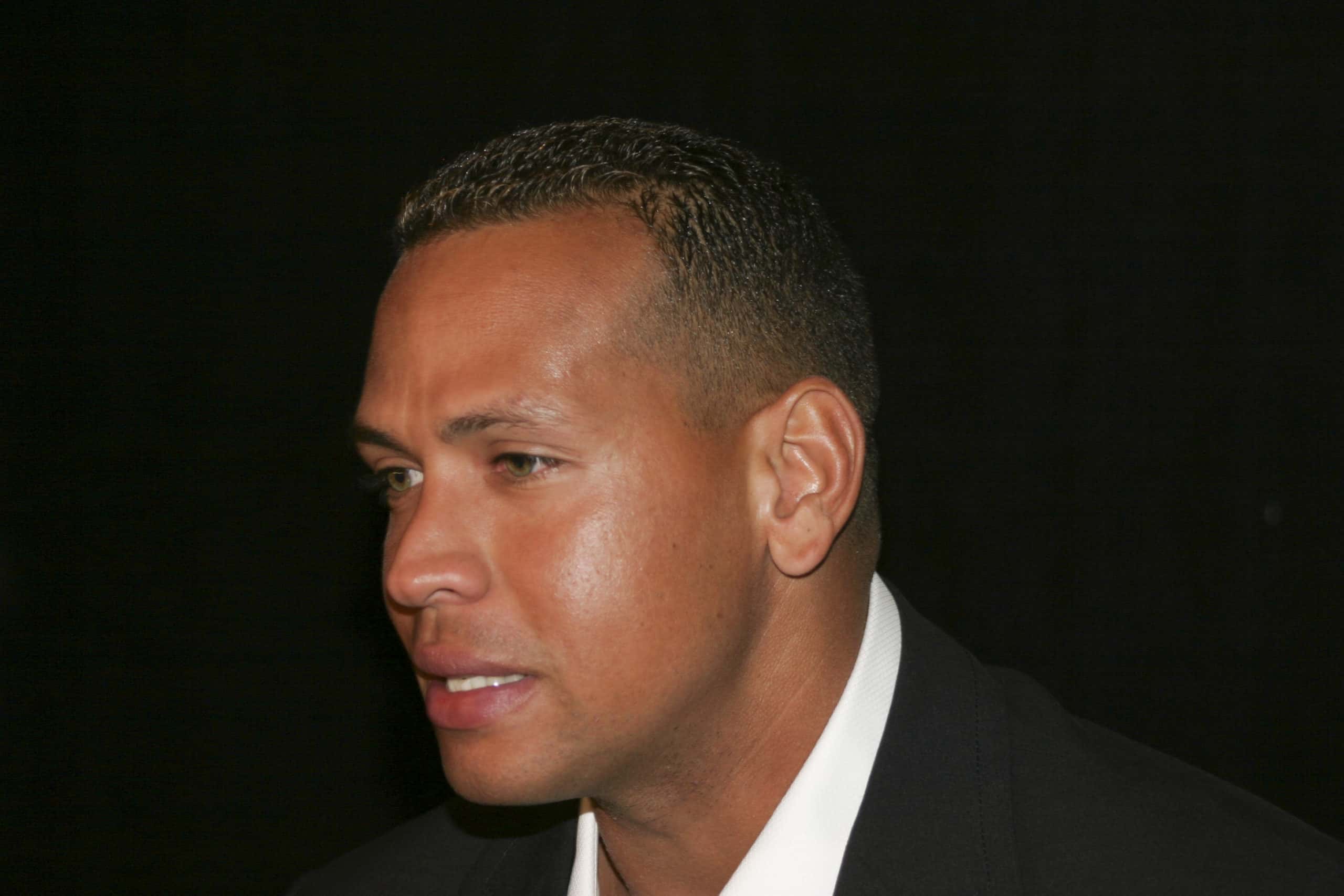 Alex Rodriguez wearing a suit