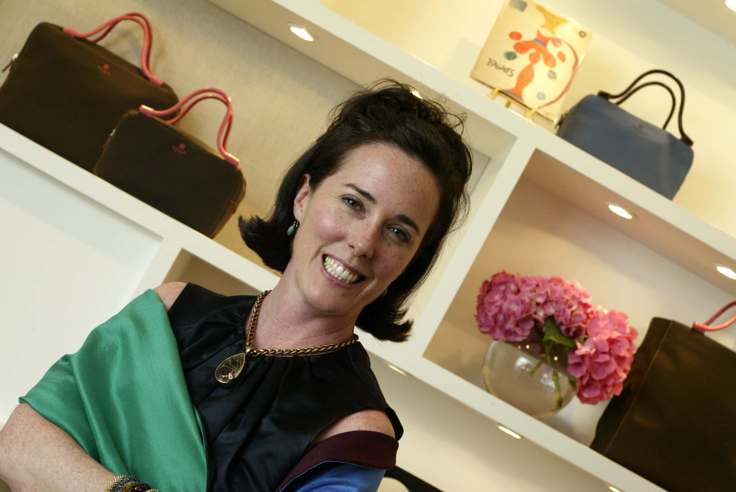 Kate Spade, a bag designer in her shop