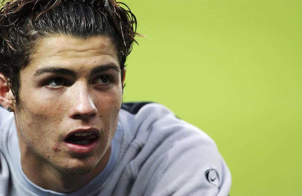 Cristiano Ronaldo of Manchester United takes a break during a training session