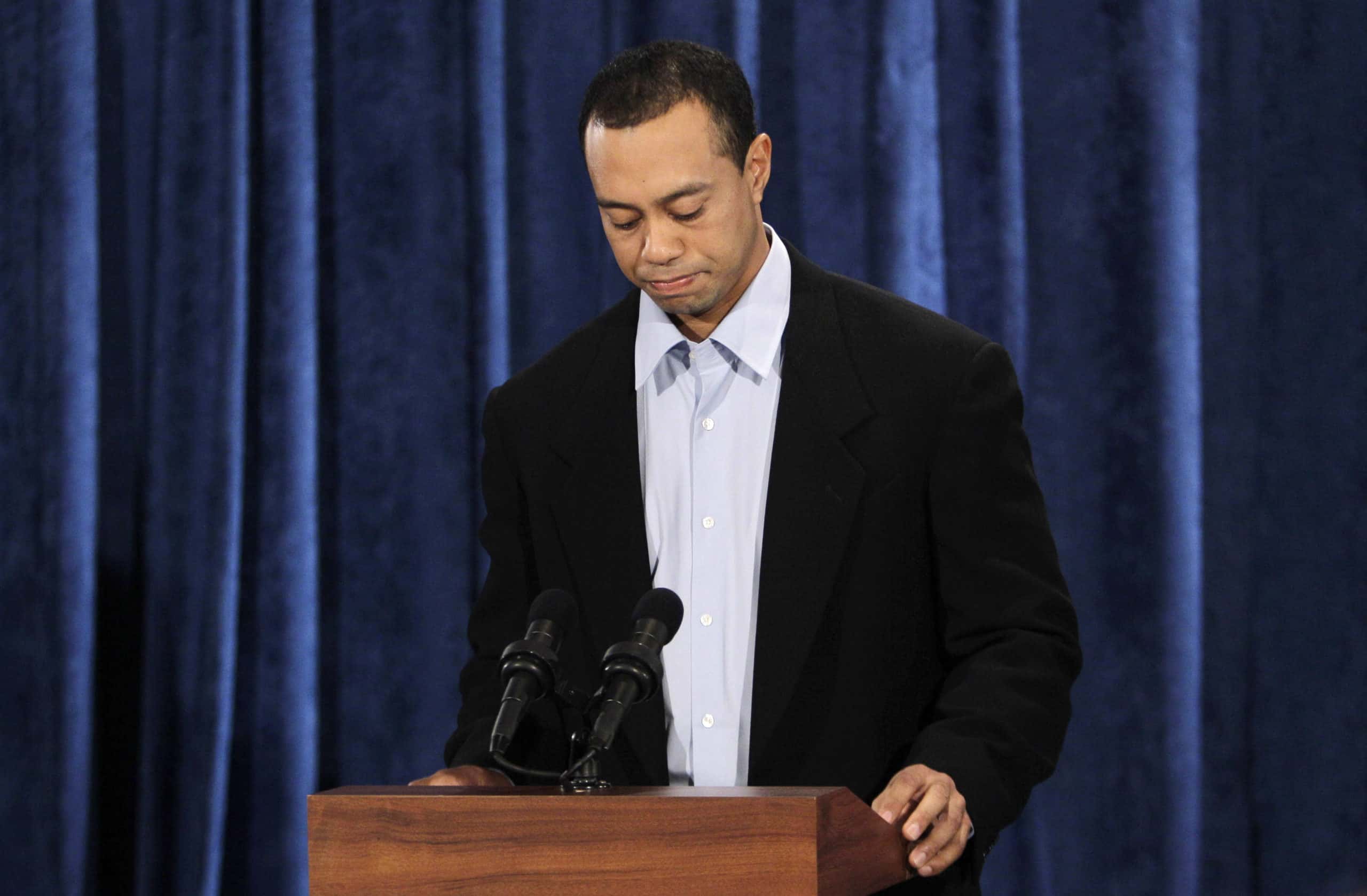 Tiger Woods pauses while making a statement from the Sunset Room