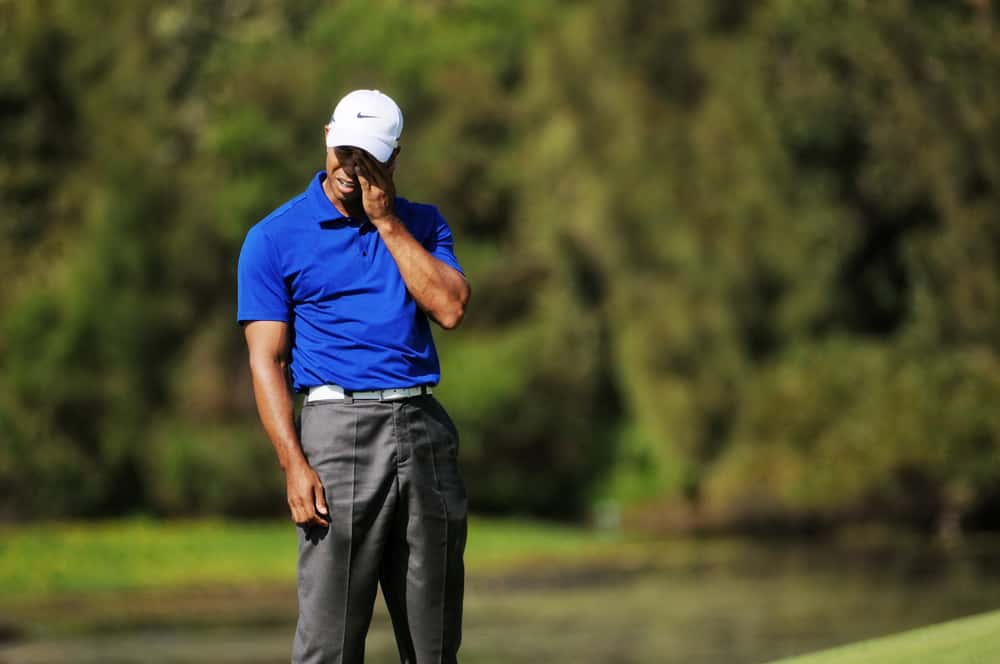 American Tiger Woods anguish at his shot in the third round in the Australian Open