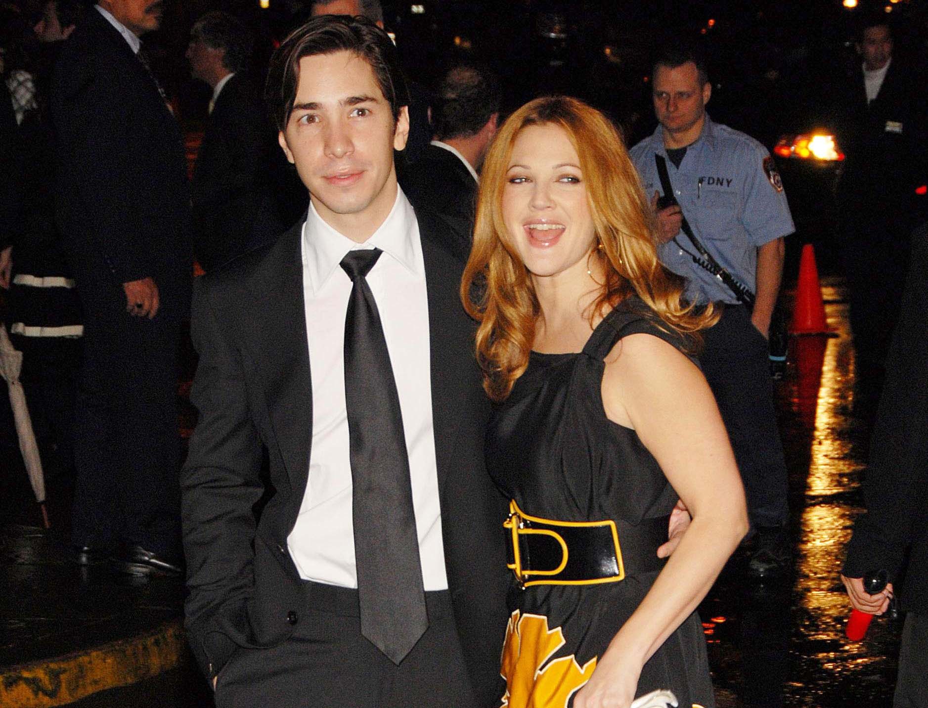 Justin Long and Drew Barrymore at A NIGHT TO BENEFIT RAISING MALAWI AND UNICEF