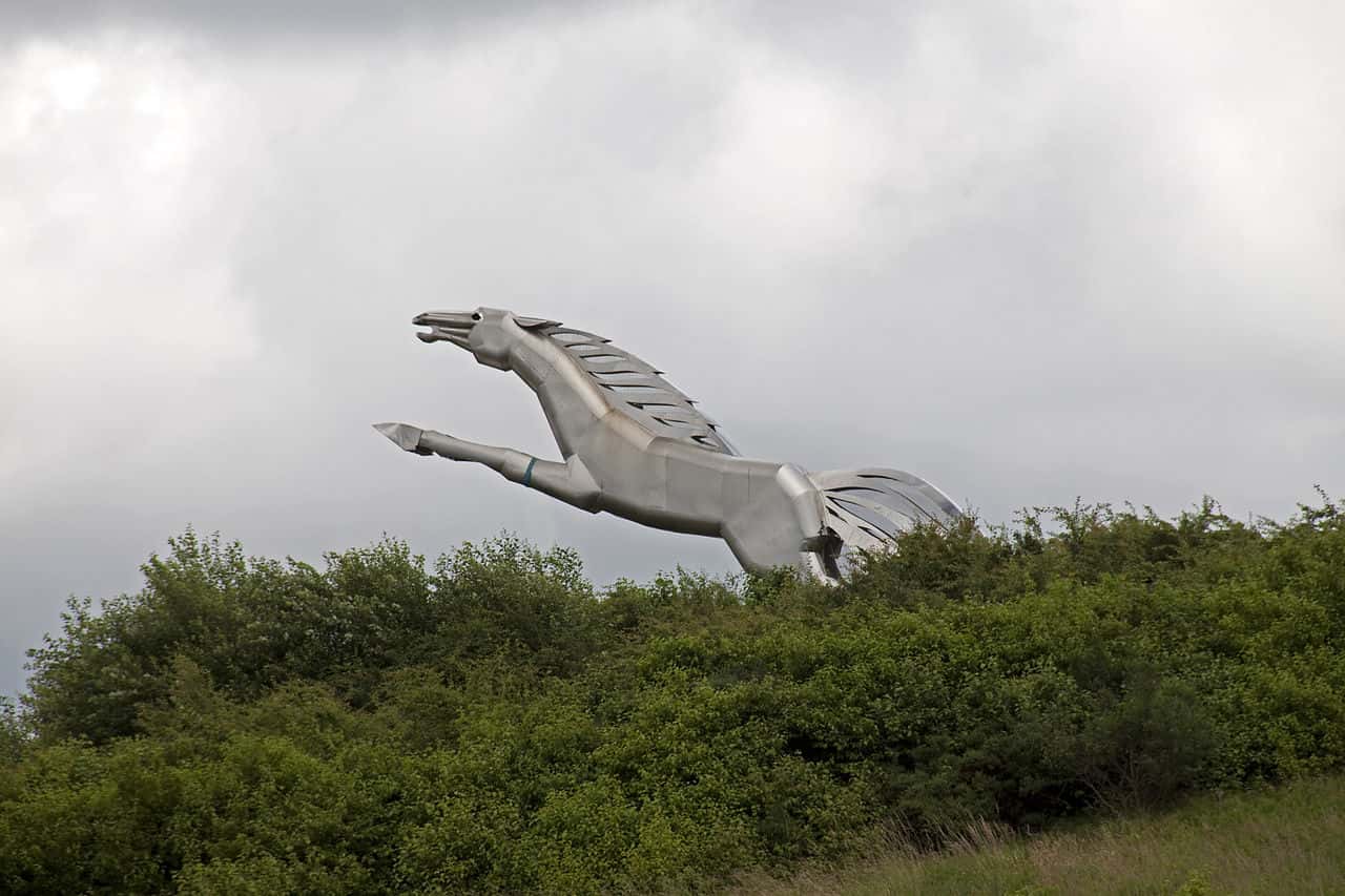 The sculpture depicts Sleipnir, the eight legged war horse of the Norse god Odin. The statue is on a hill overlooking Wednesbury Great Western Street Metro Stop