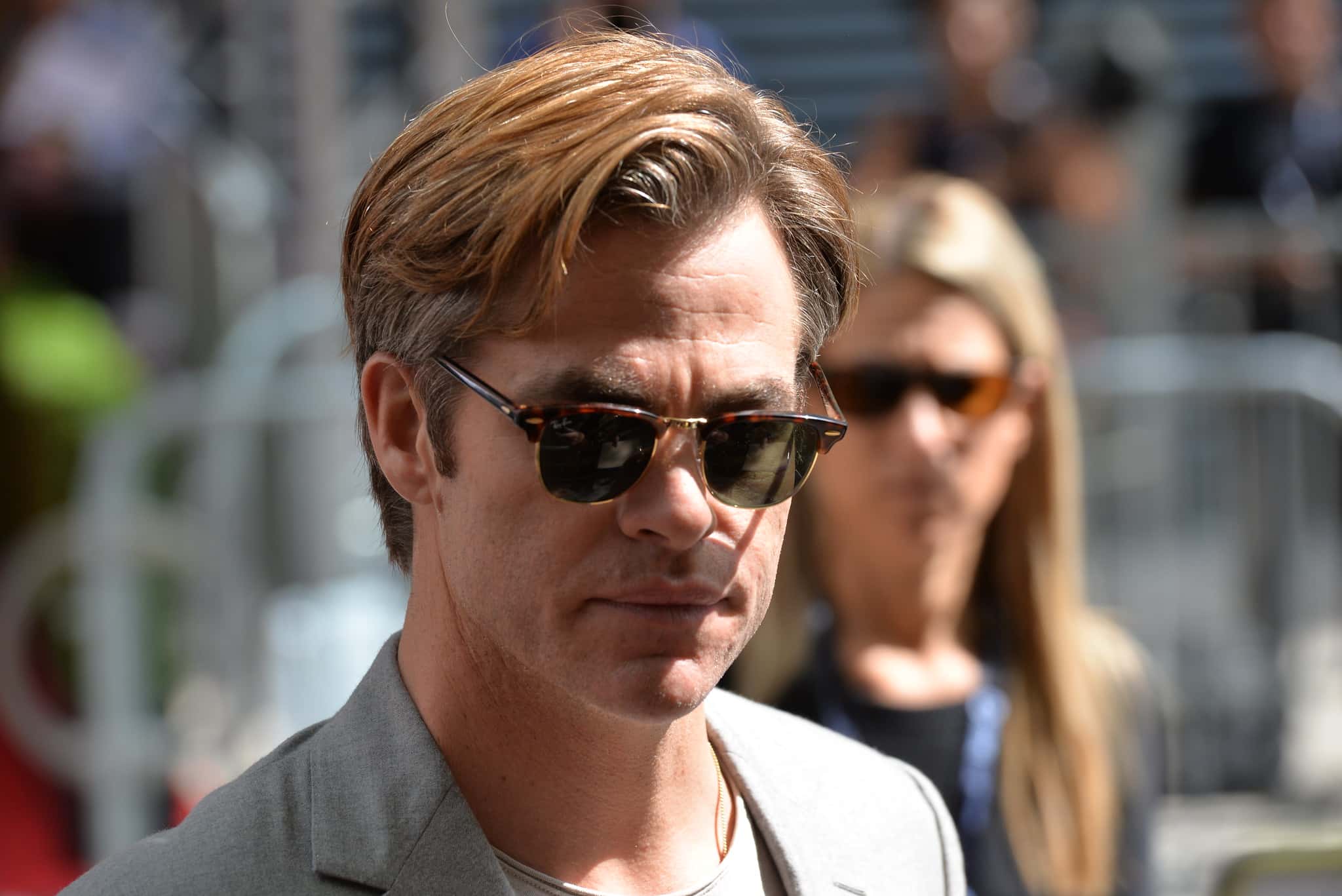 Chris Pine wearing black sunglasses