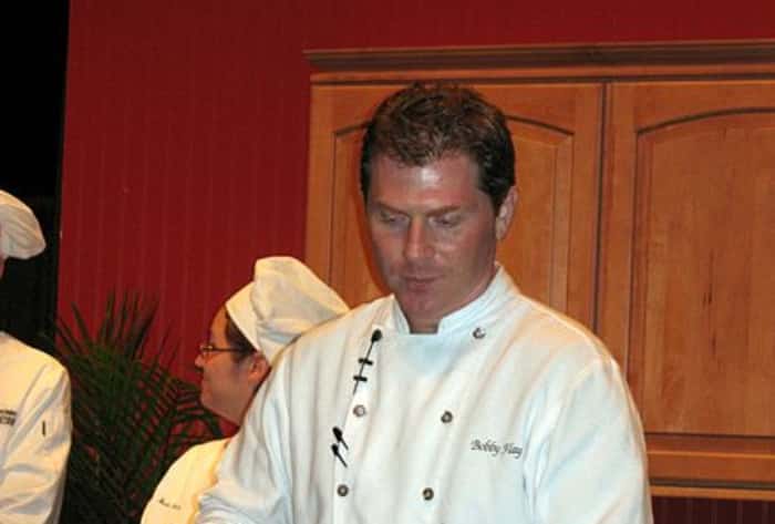Bobby Flay wearing a uniform