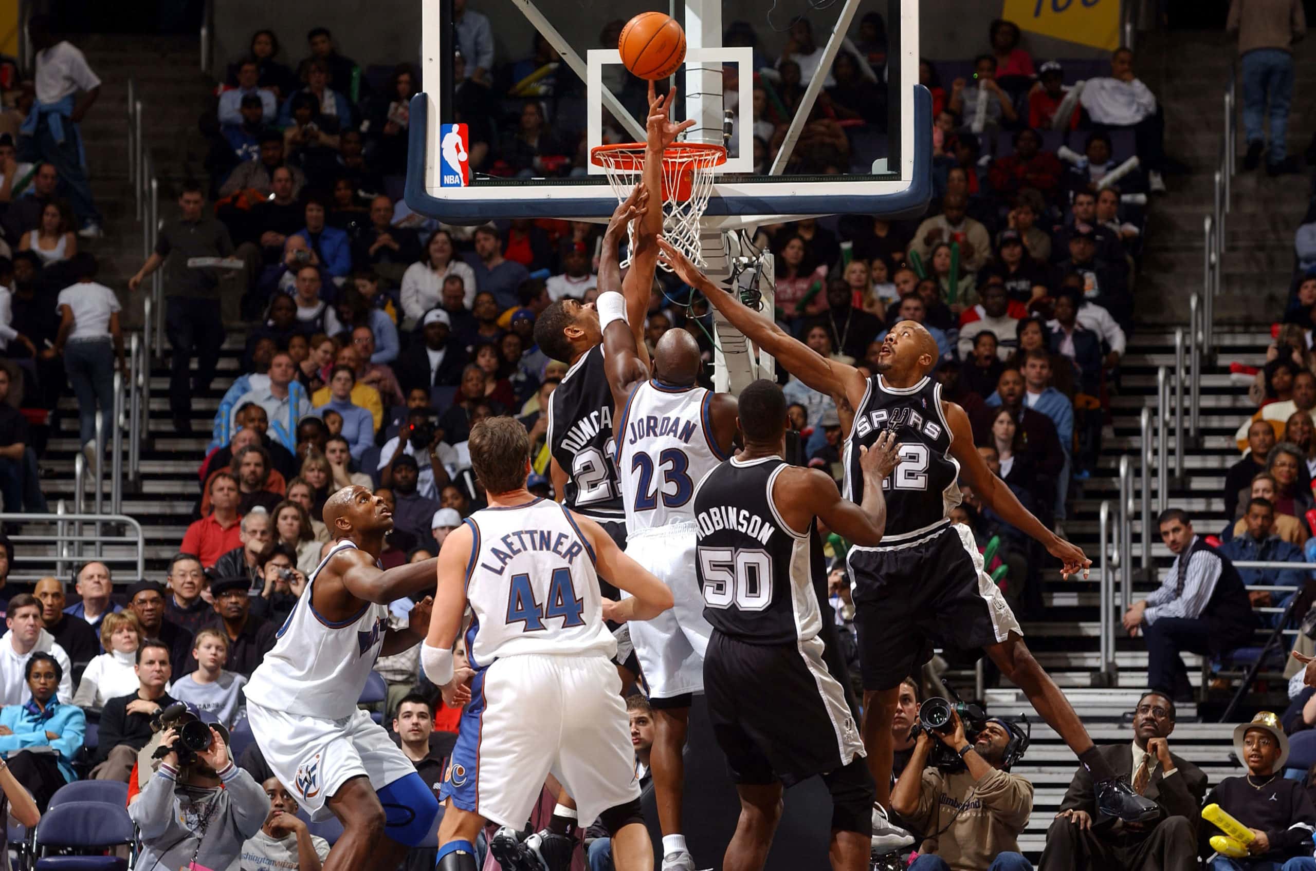 Tim Duncan #21 of the San Antonio Spurs blocks a shot by Michael Jordan #23