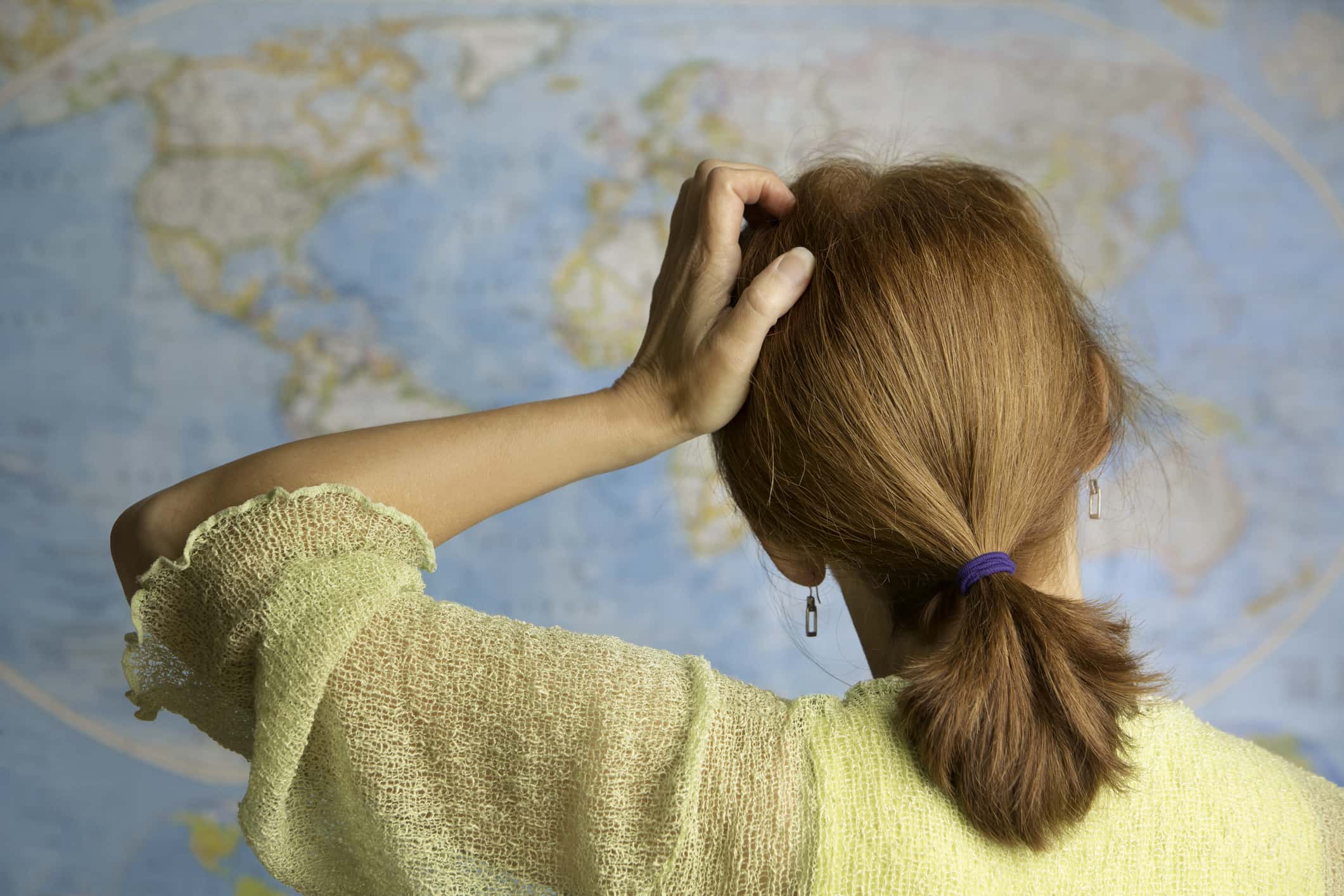 A woman Scratching Her Head
