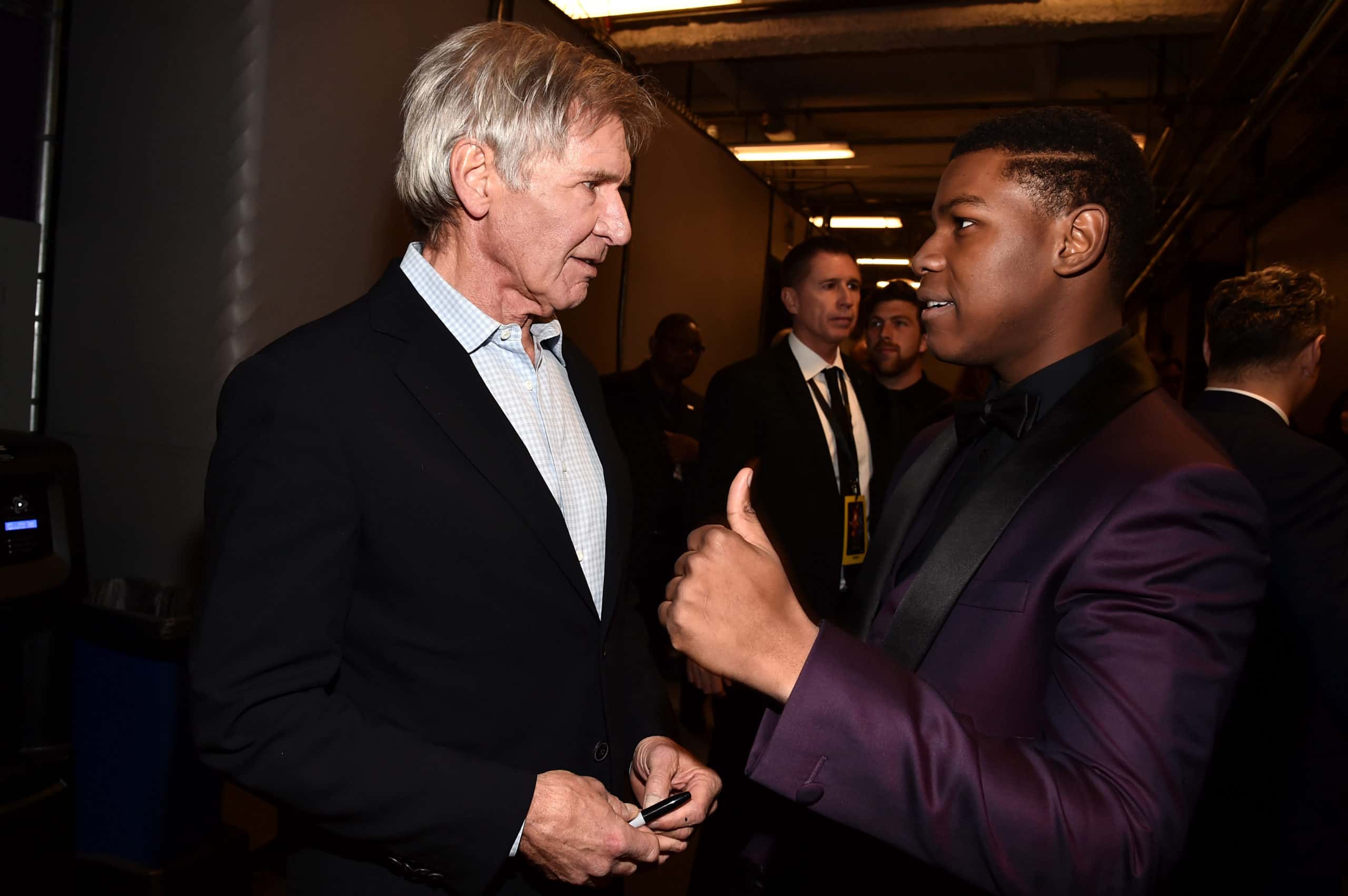 Actors Harrison Ford and John Boyega attend the World Premiere of Star Wars: The Force Awakens