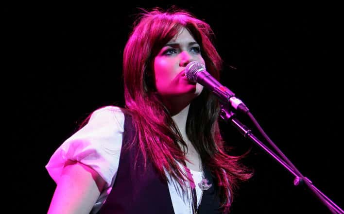 US singer Mandy Moore, supporting Kelly Clarkson, performs on stage