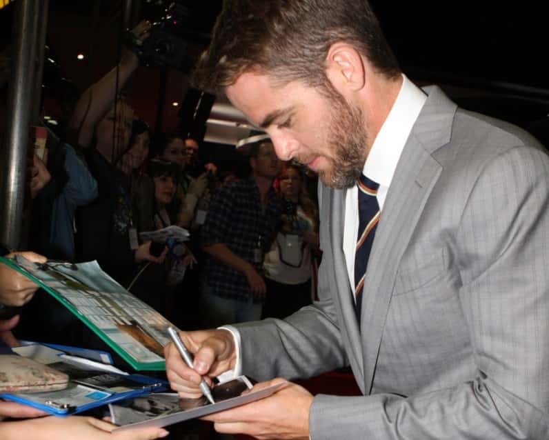 Chris Pine wearing a grey suit
