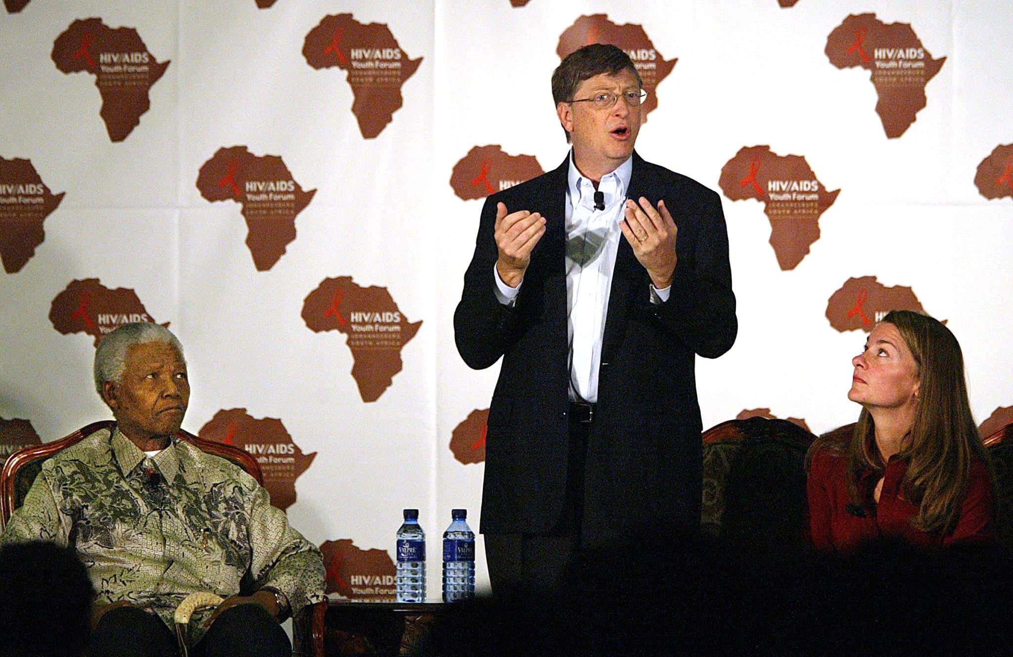 Microsoft owner Bill Gates (C) addresses a youth forum on HIV/AIDS at the University of Witwatersrand in Johannesburg