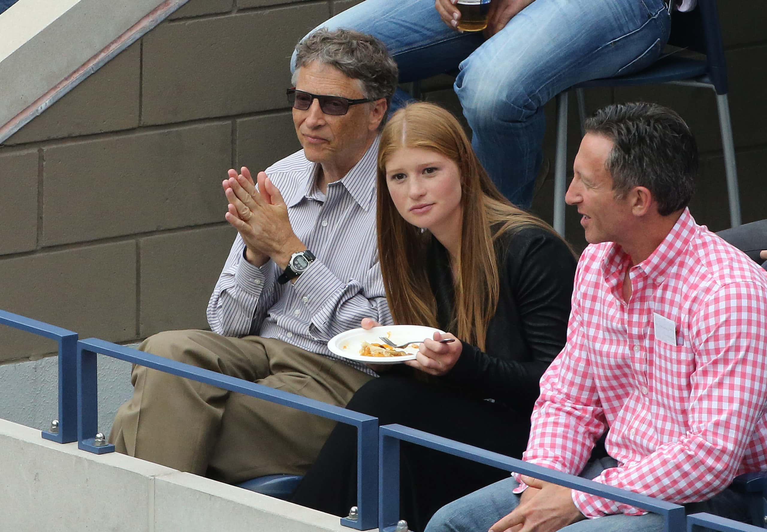 Bill Gates and his daughter Jennifer Gates attend the men's final on Day 15 of the 2014 US Open