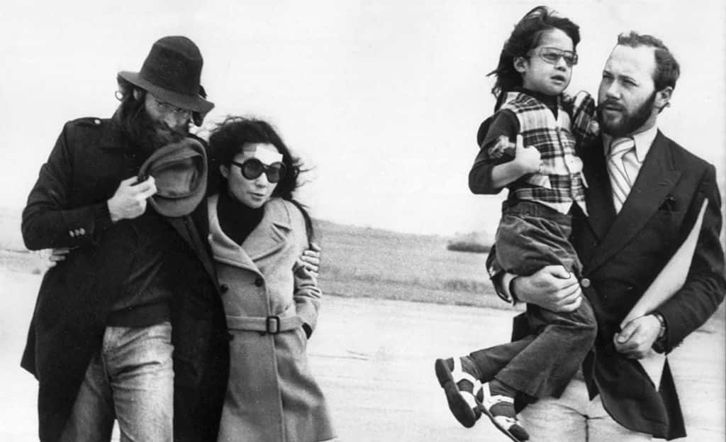 John Lennon and Yoko Ono at Dalcross Airport in Inverness to board a private jet to London.