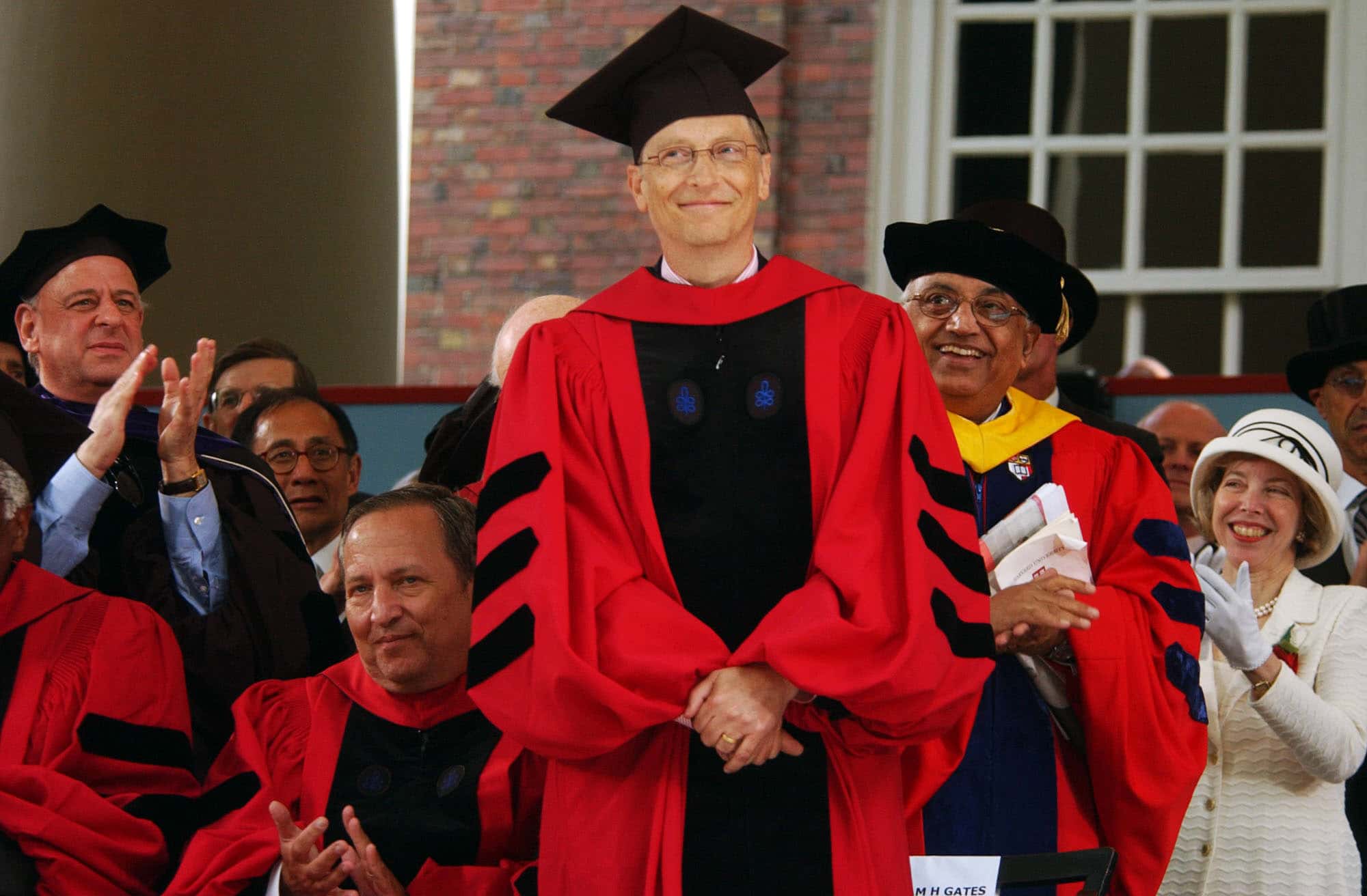 Microsoft co-founder and Chairman Bill Gates receives applause during commencement ceremonies at Harvard University