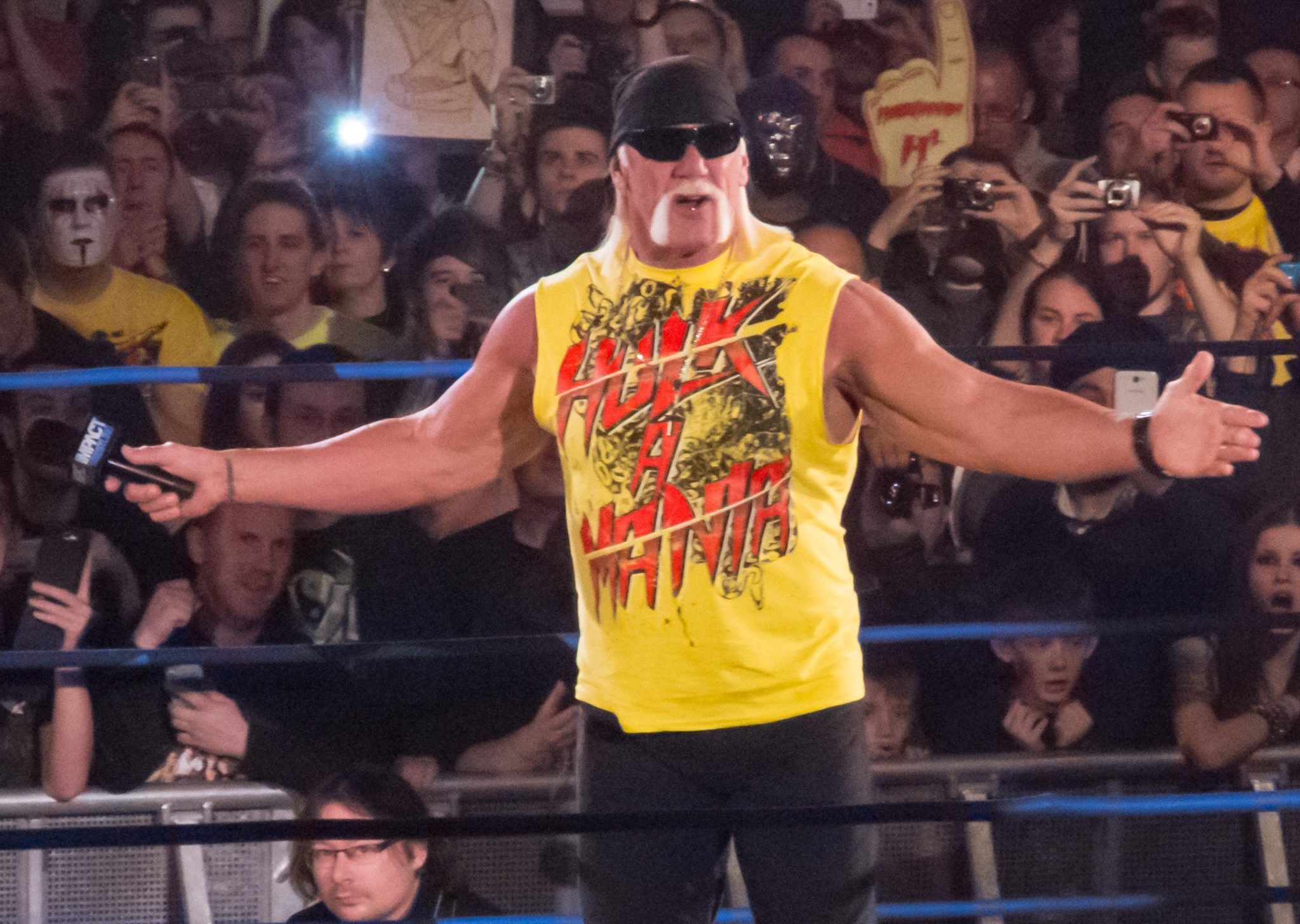 Hulk Hogan at the Impact! in ring with opened arms 
