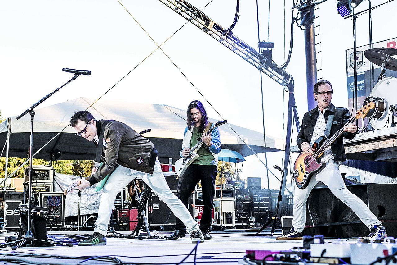 Photo of the band Weezer performing on stage