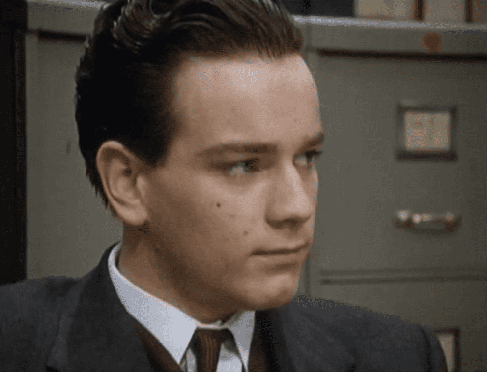 A visually captivating still taken from a pivotal moment in the television series Lipstick on Your Collar (1993)