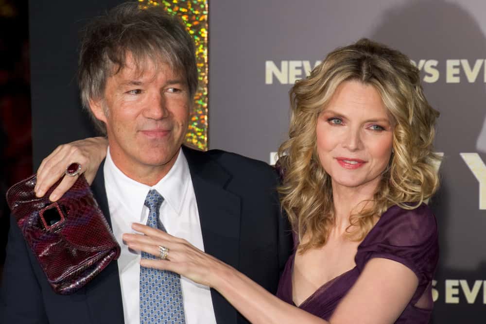 Michelle Pfeiffer and David E. Kelley arrive at the premiere of "New Year's Eve"