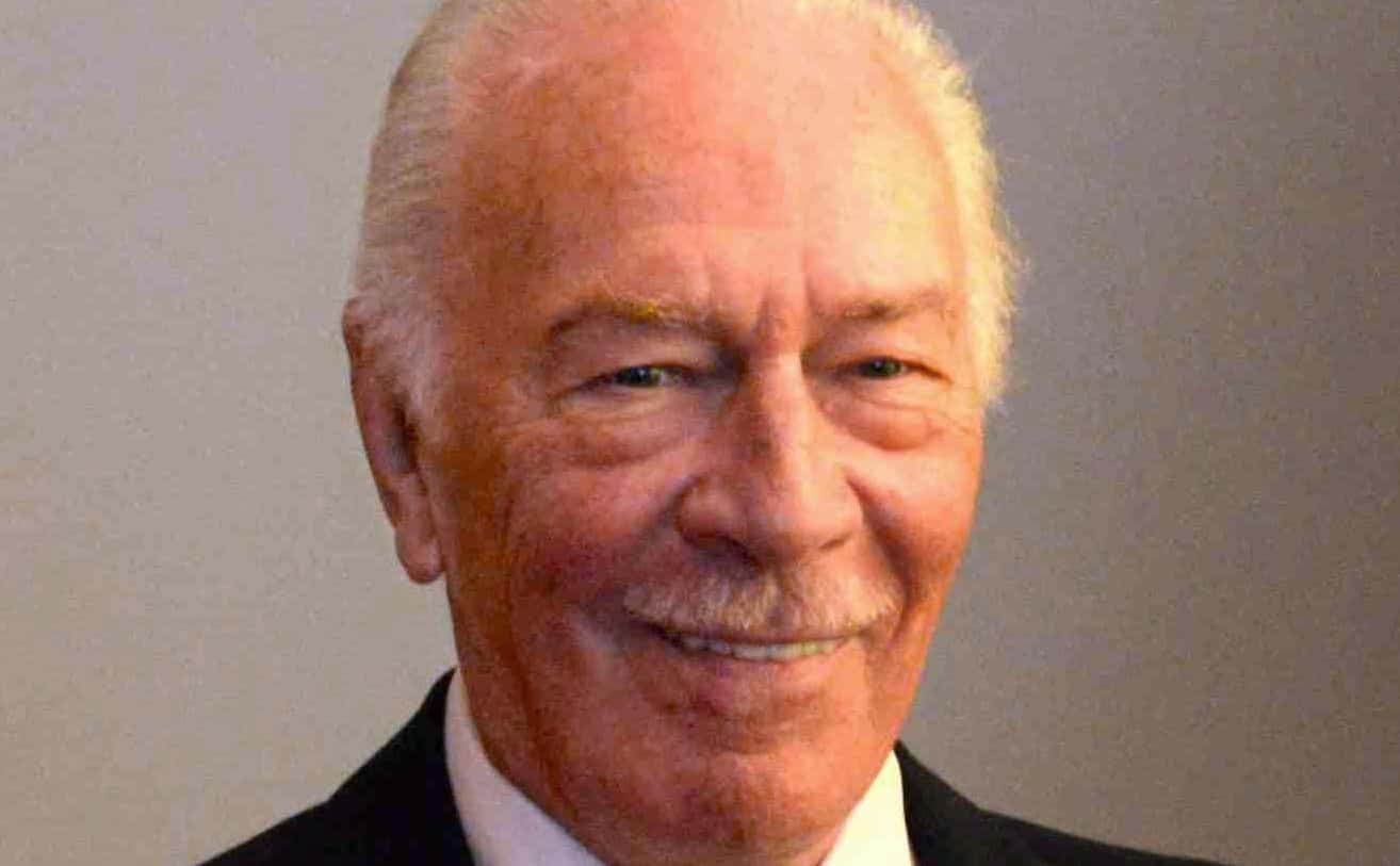 Christopher Plummer wearing a suit