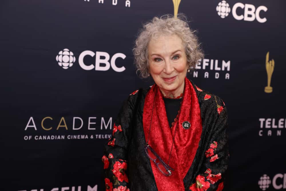 Margaret Atwood wearing black and red shirt
