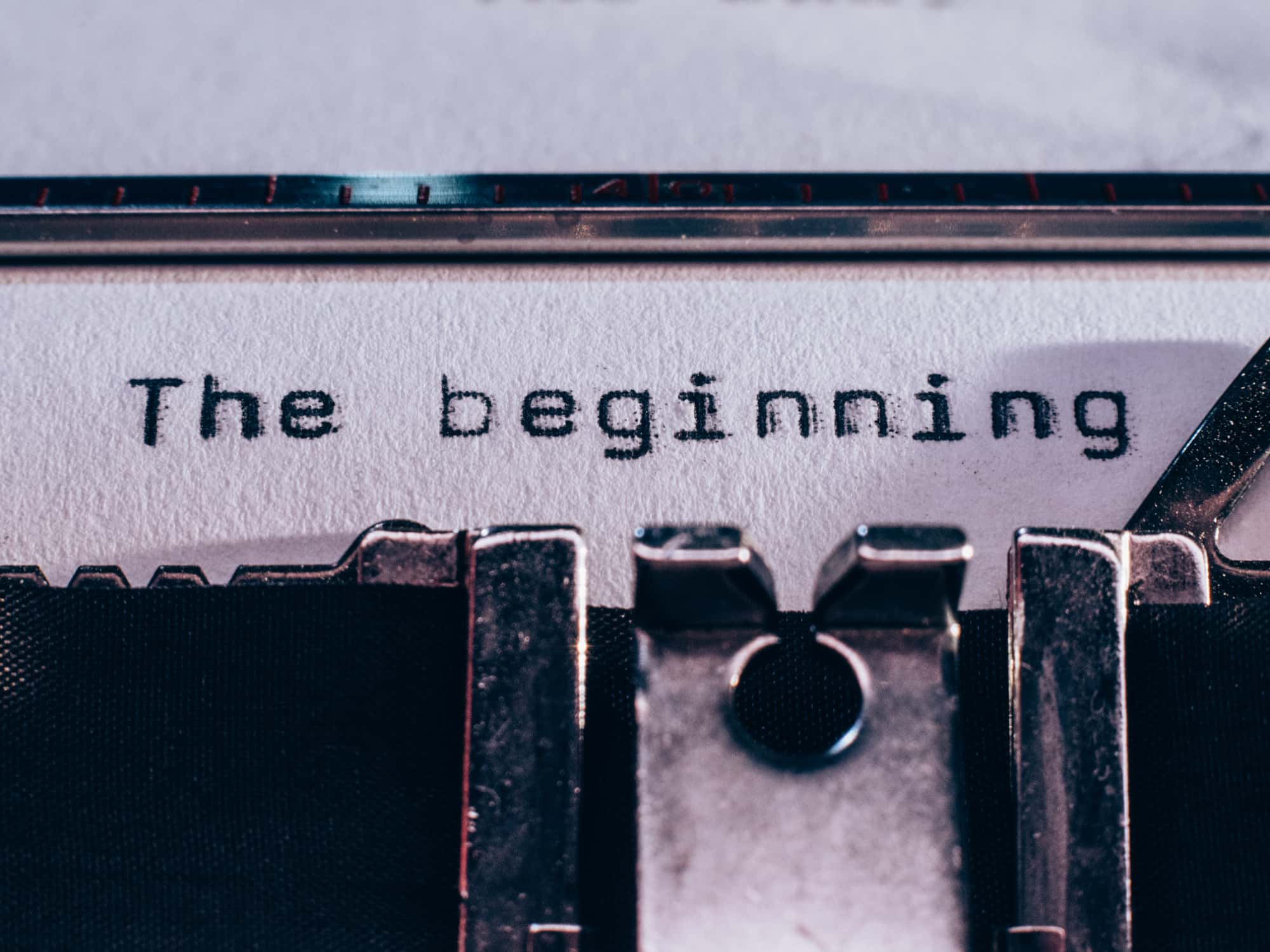 The beginning typed on paper on vintage typewriter.