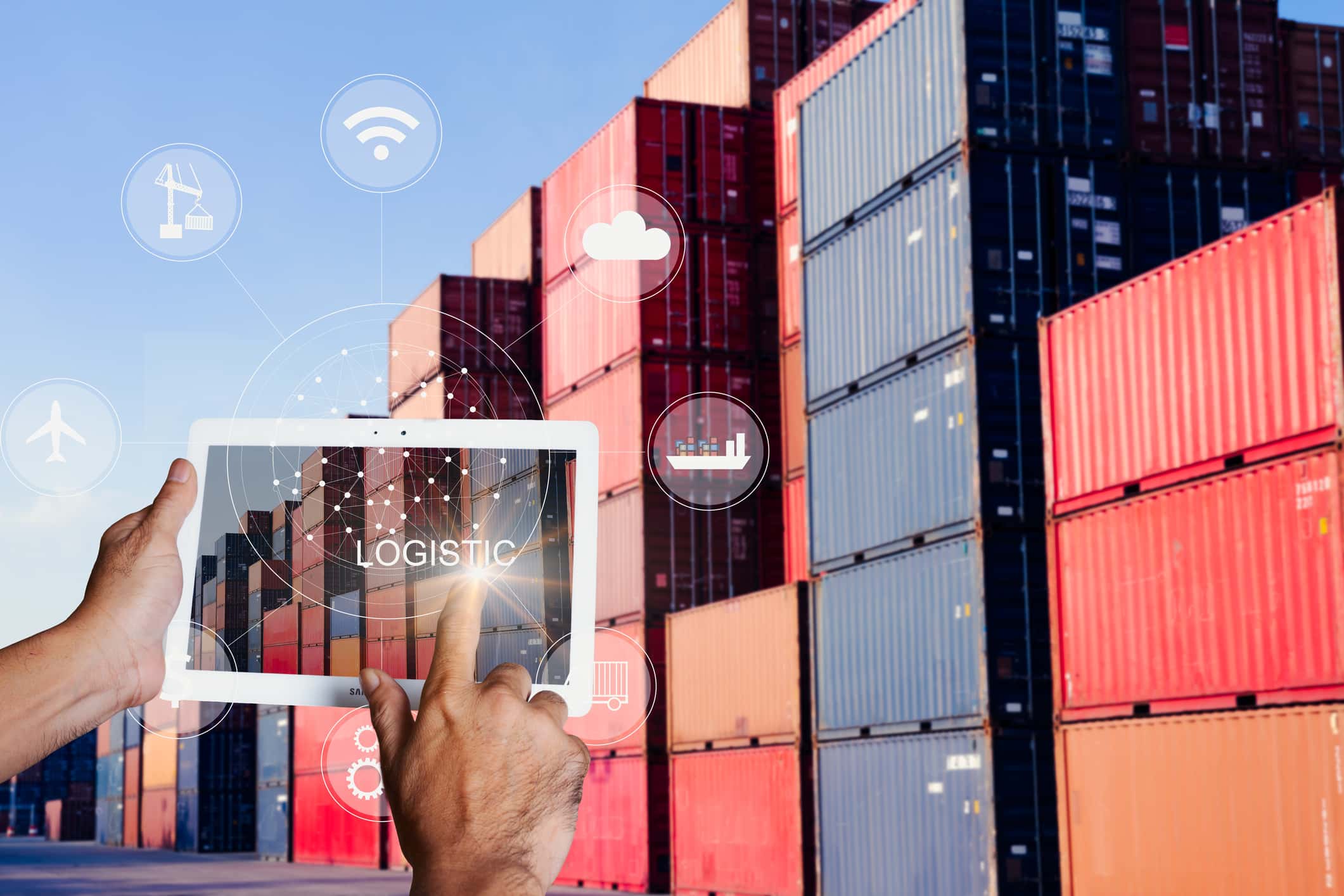 Businessman hand holding tablet with touch screen technology interface