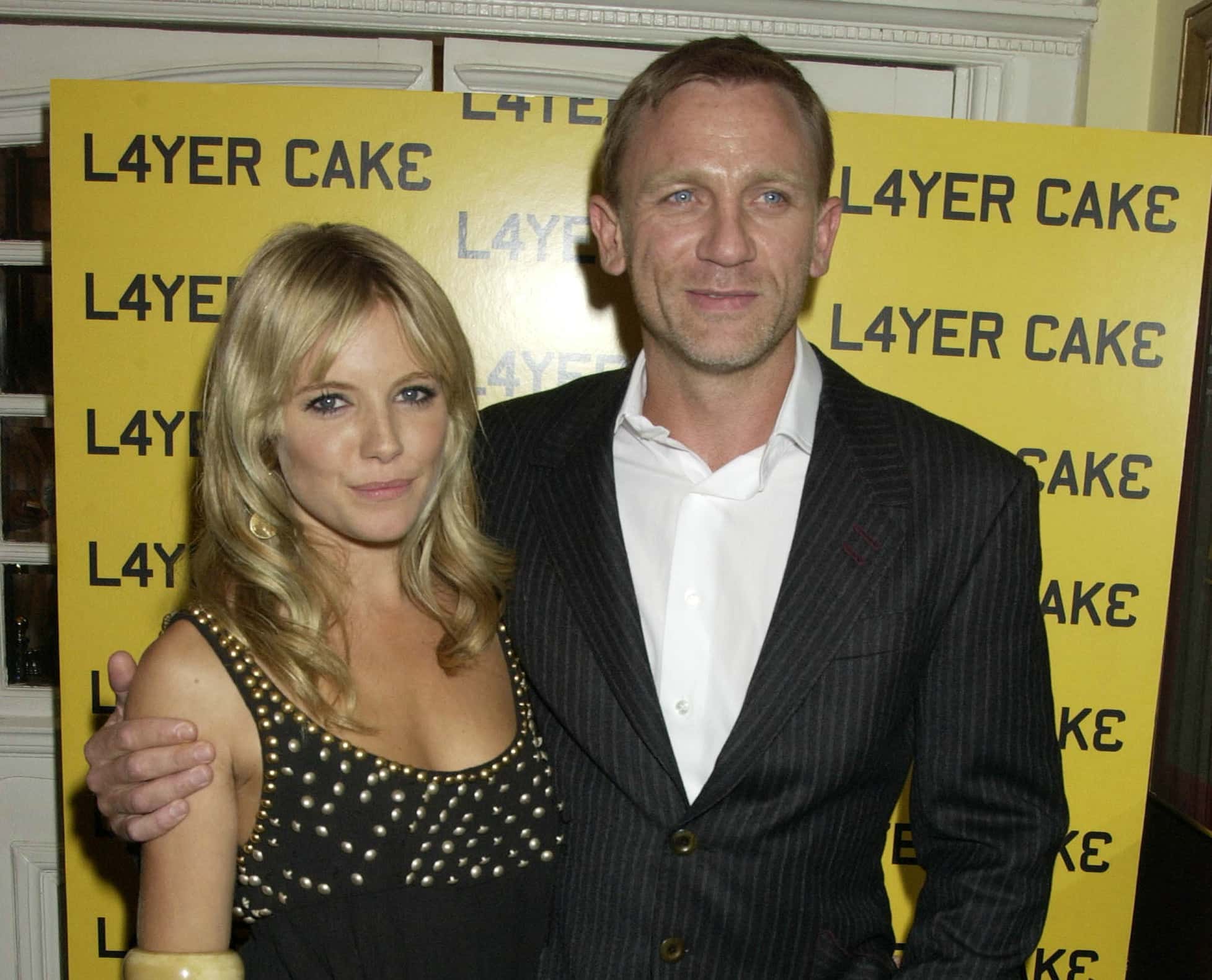Sienna Miller and Daniel Craig arrive at the UK premiere of "Layer Cake"