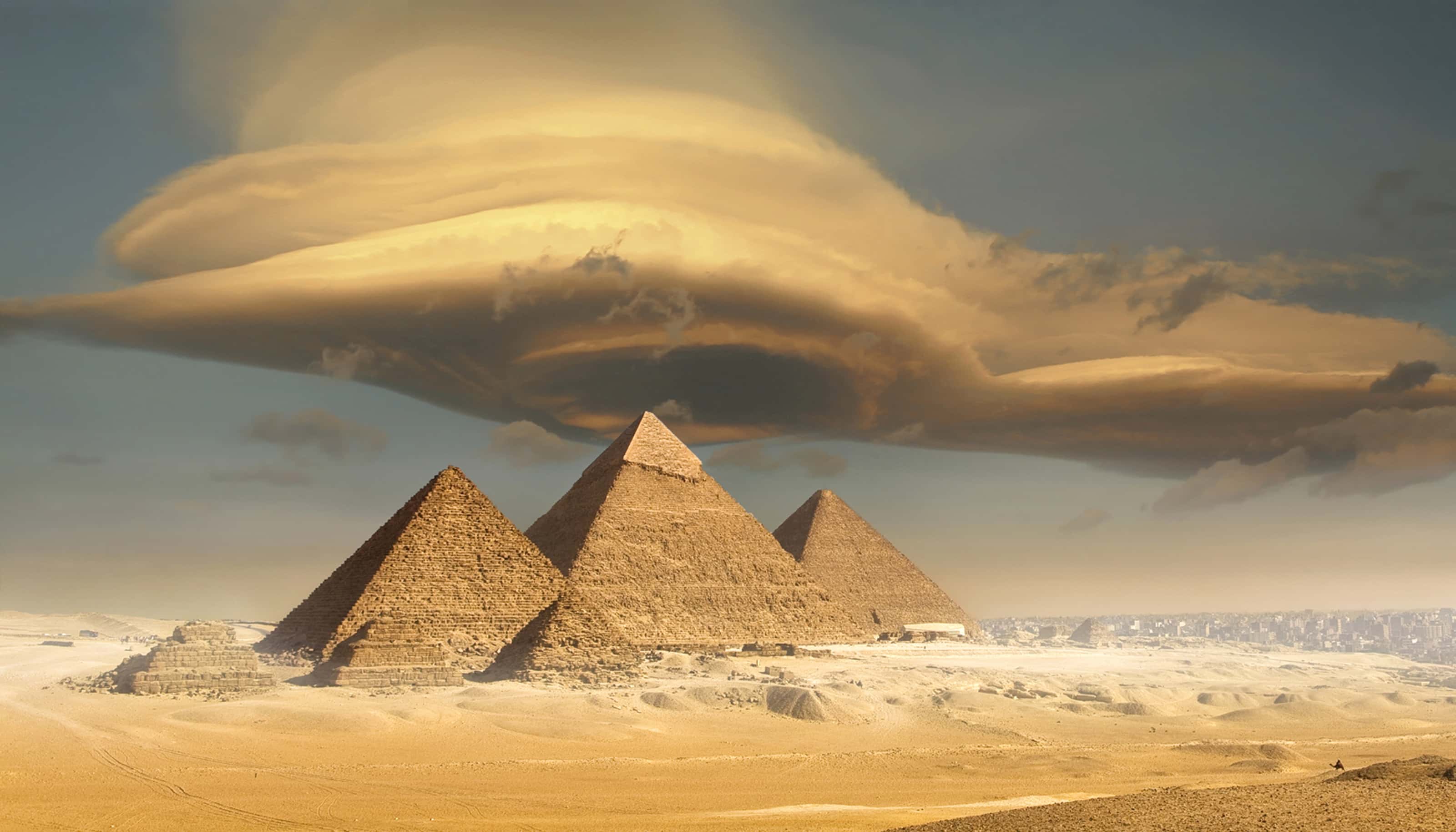 Dramatic storm cloud above pyramids, Giza, Egypt