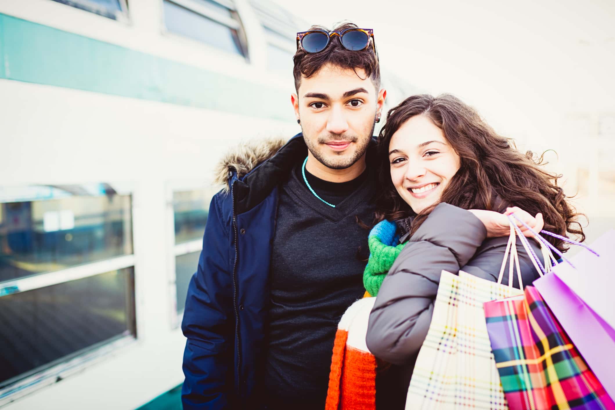 Young couple in love at train station.