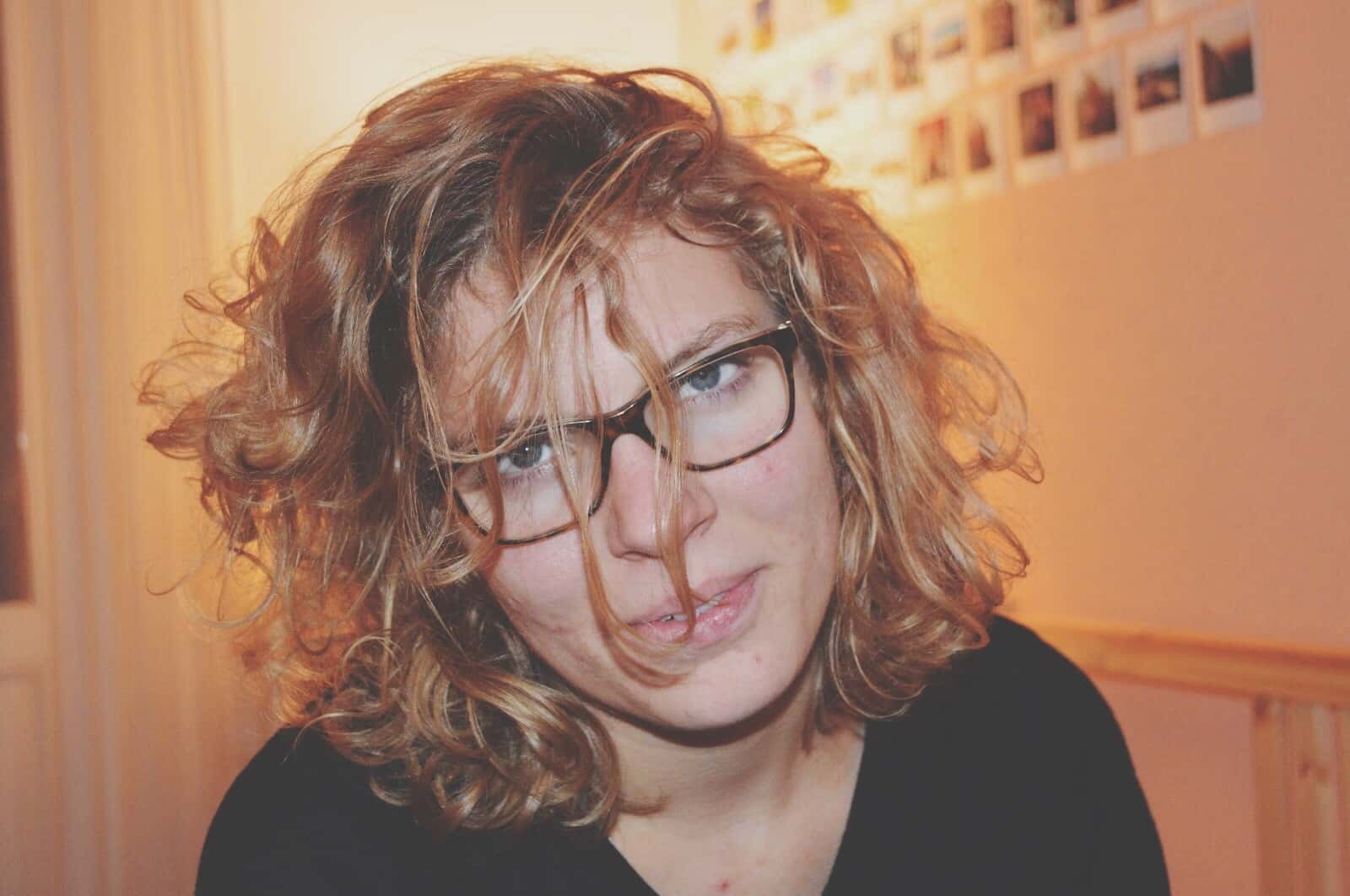 Close-Up Portrait Of Woman With Messy Hair.