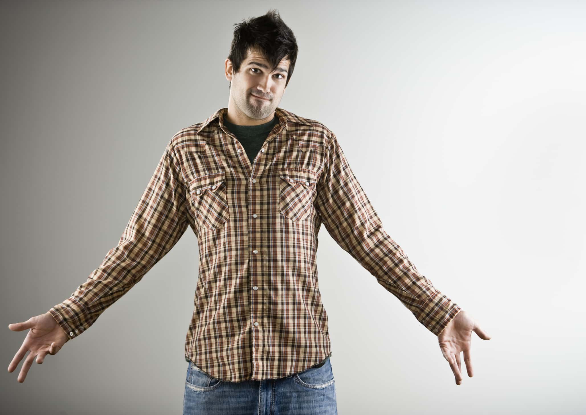 Native American man shrugging shoulders