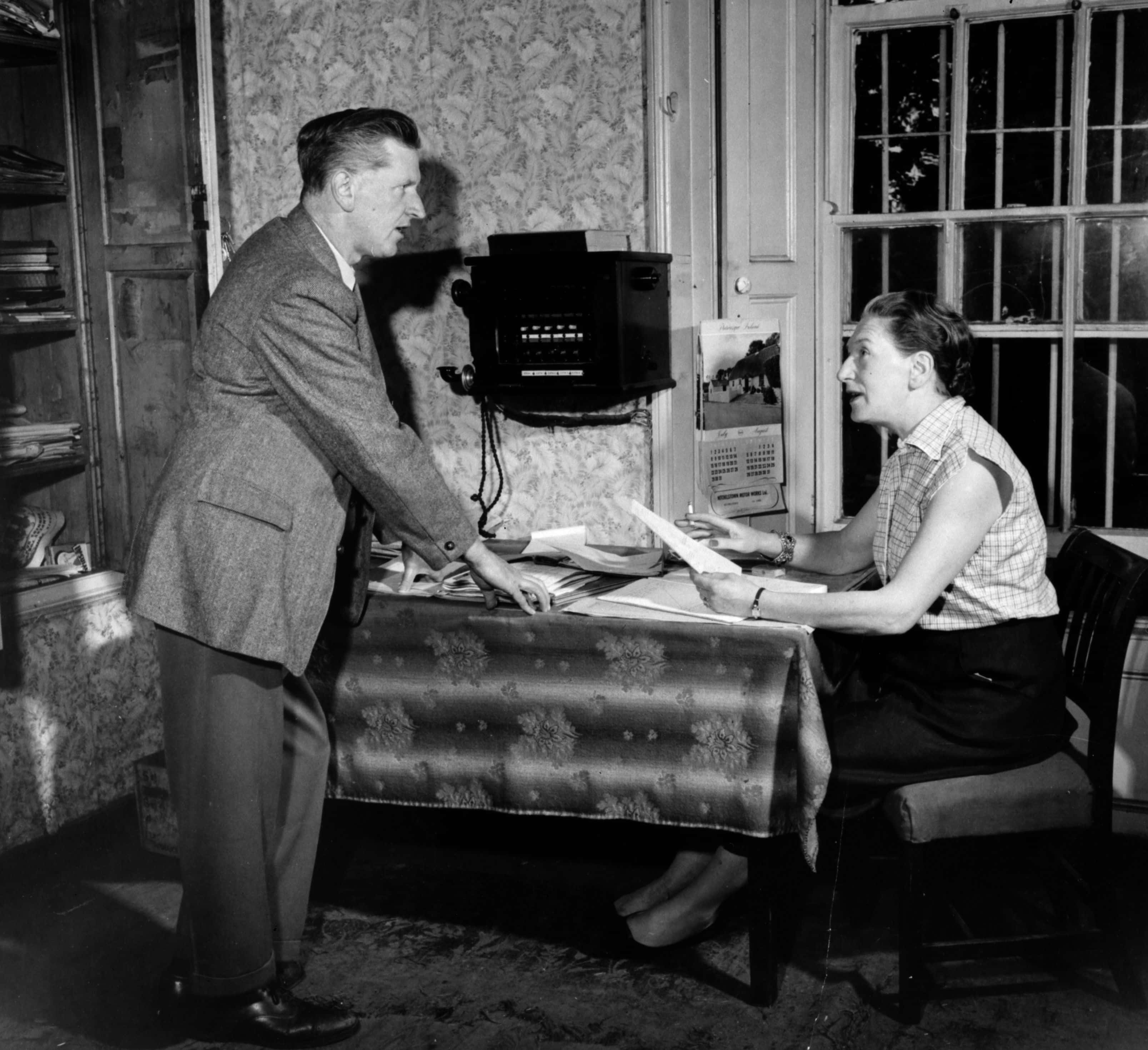 Irish novelist and short-story writer Elizabeth Bowen (1899 - 1973) working at her home, Bowen's Court in Kildorrey
