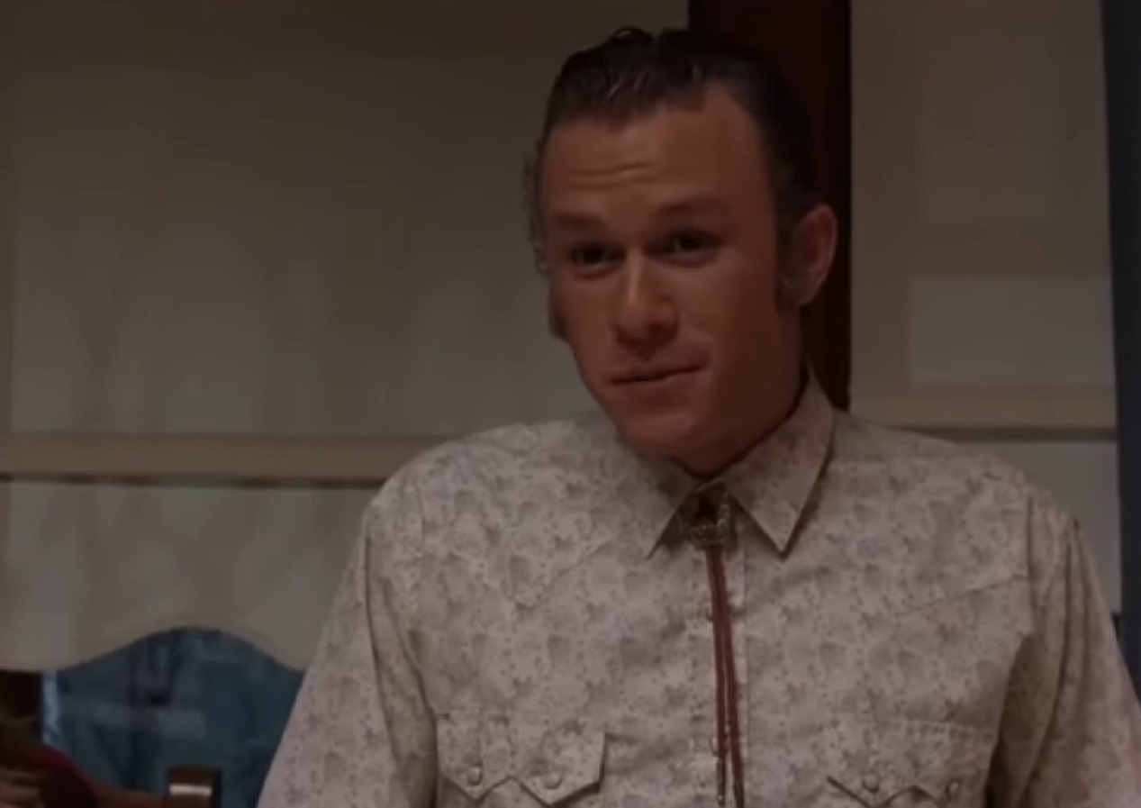 Screenshot: Heath Ledger wearing white shirt and talking - from Brokeback Mountain (2005)