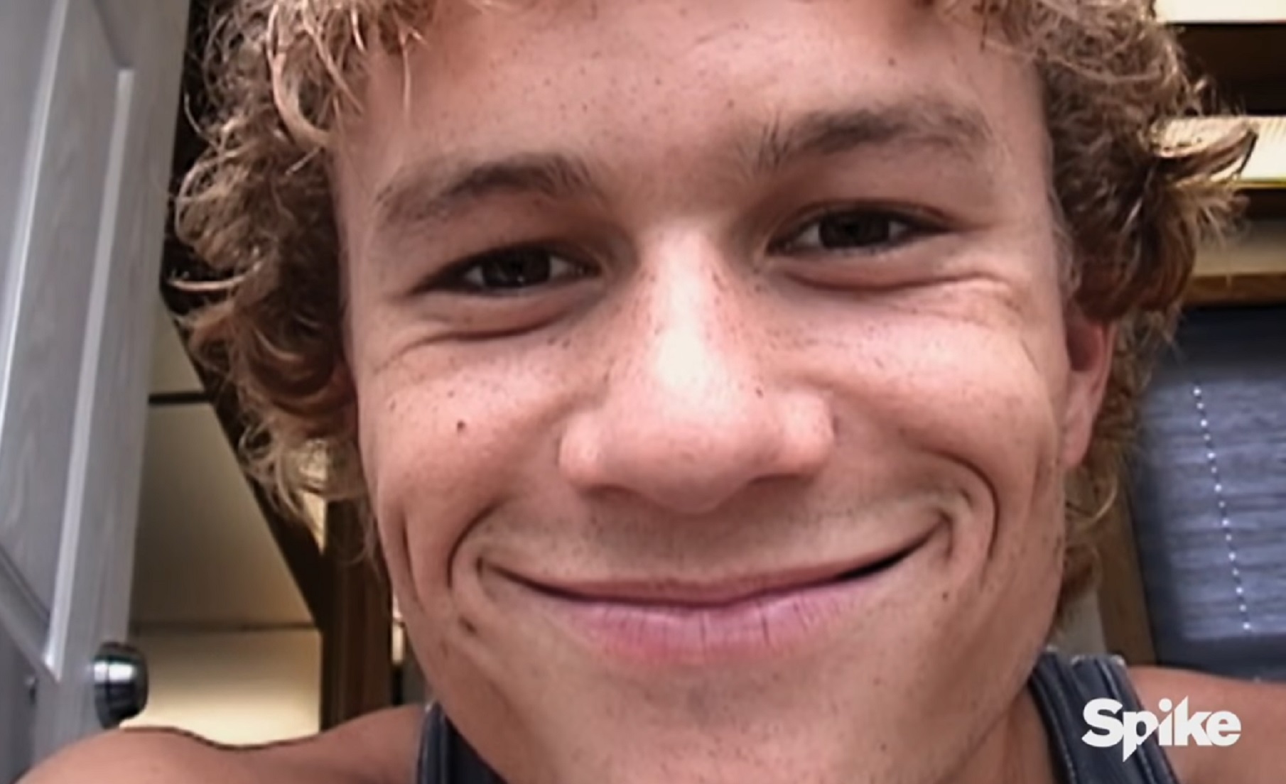 Screenshot: Heath Ledger close up face shot looking at camera and smiling - from I Am Heath Ledger (2017)