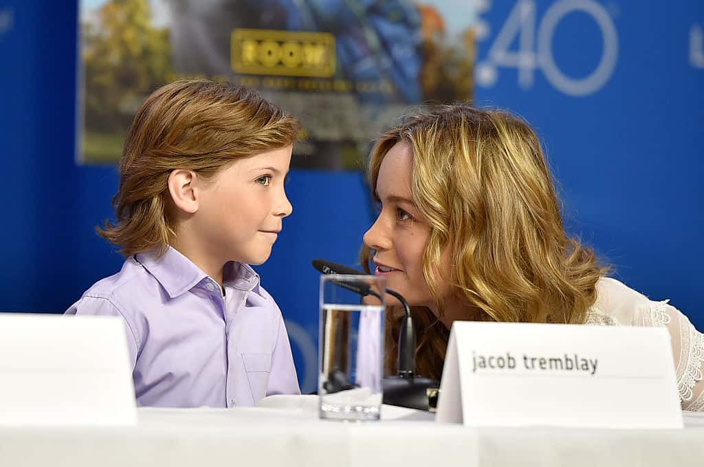 Jacob Tremblay (L) and Brie Larson speak onstage during the 