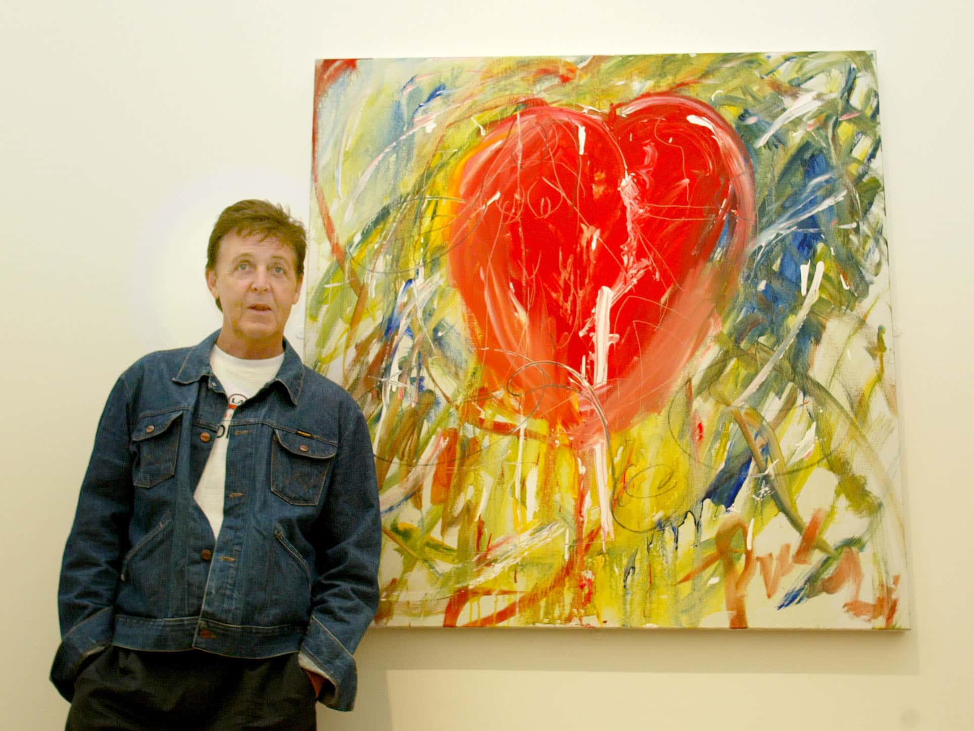 Sir Paul McCartney views his own abstract painting, called Big Heart