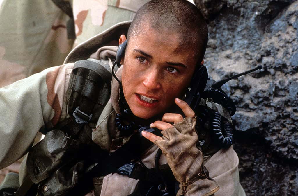 Demi Moore talking on walkie talkie in a scene from the film 'G.I. Jane', 1997.