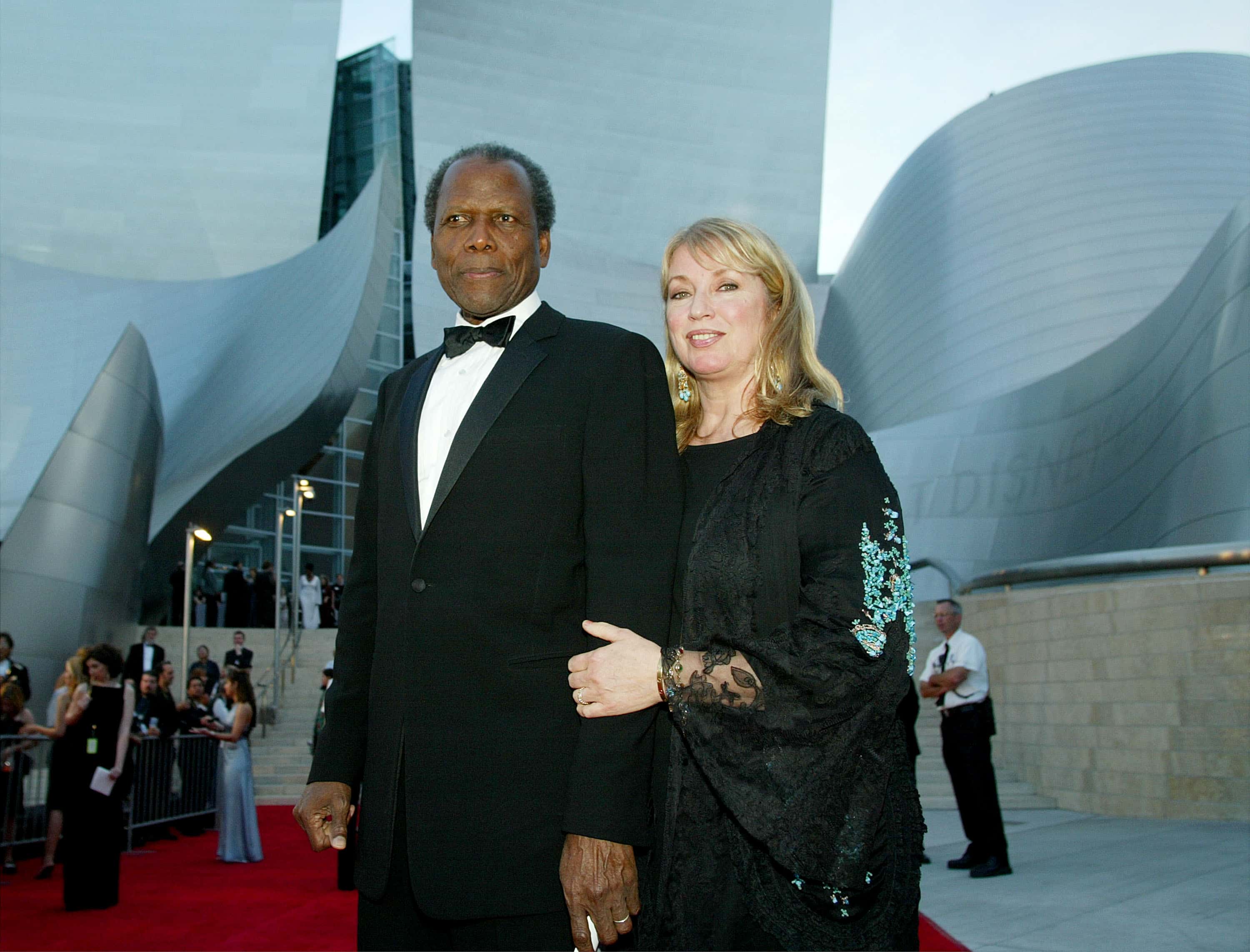 Sidney Poitier and second wife Joanna Shimkus attend the Walt Disney Concert Hall opening gala 2003
