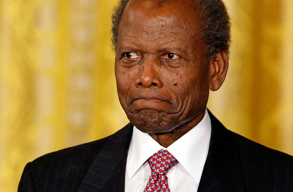 Sidney Poitier prepares to receive the Medal of Freedom during a ceremony in the East Room of the White House August 12, 2009