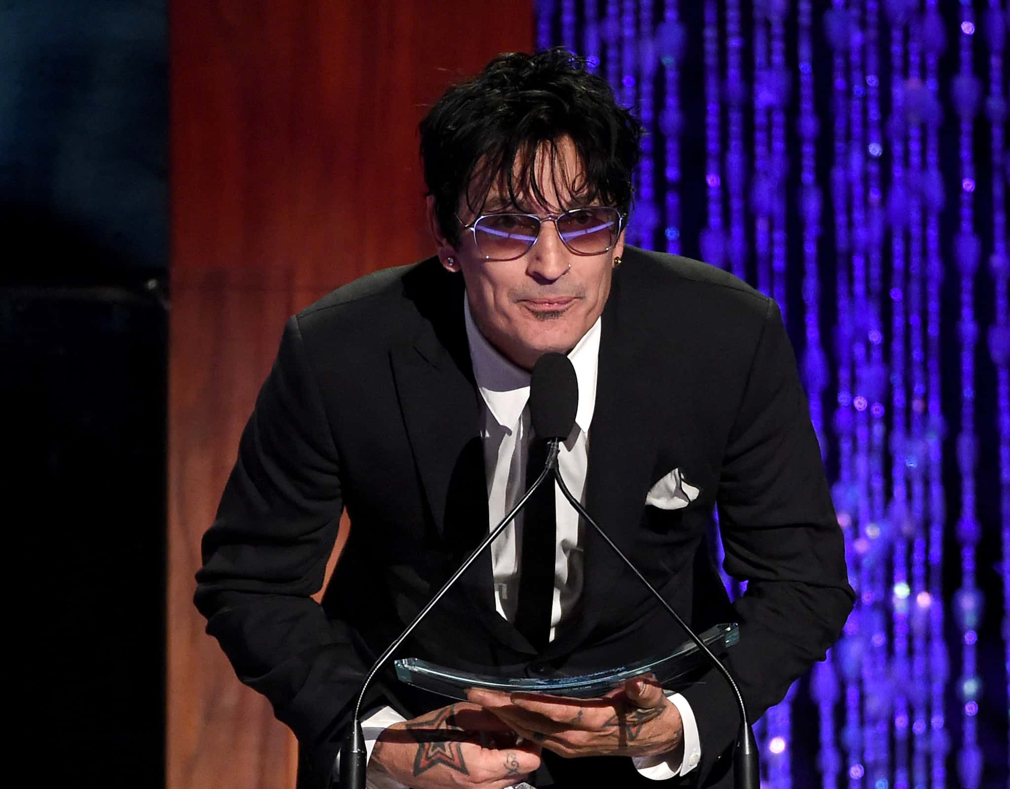 Musician Tommy Lee accepts the Skins award onstage at PETA