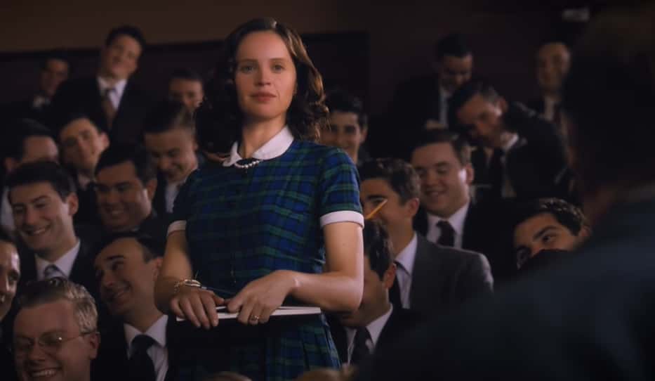 Felicity Jones as Ruth Bader Ginsburg in blue suit at school