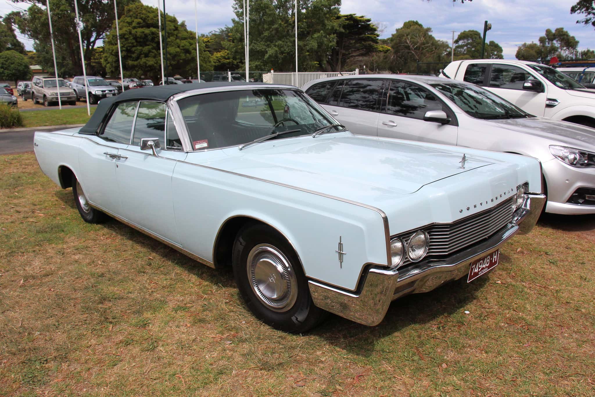 1966 Lincoln Continental Convertible on a parking lot