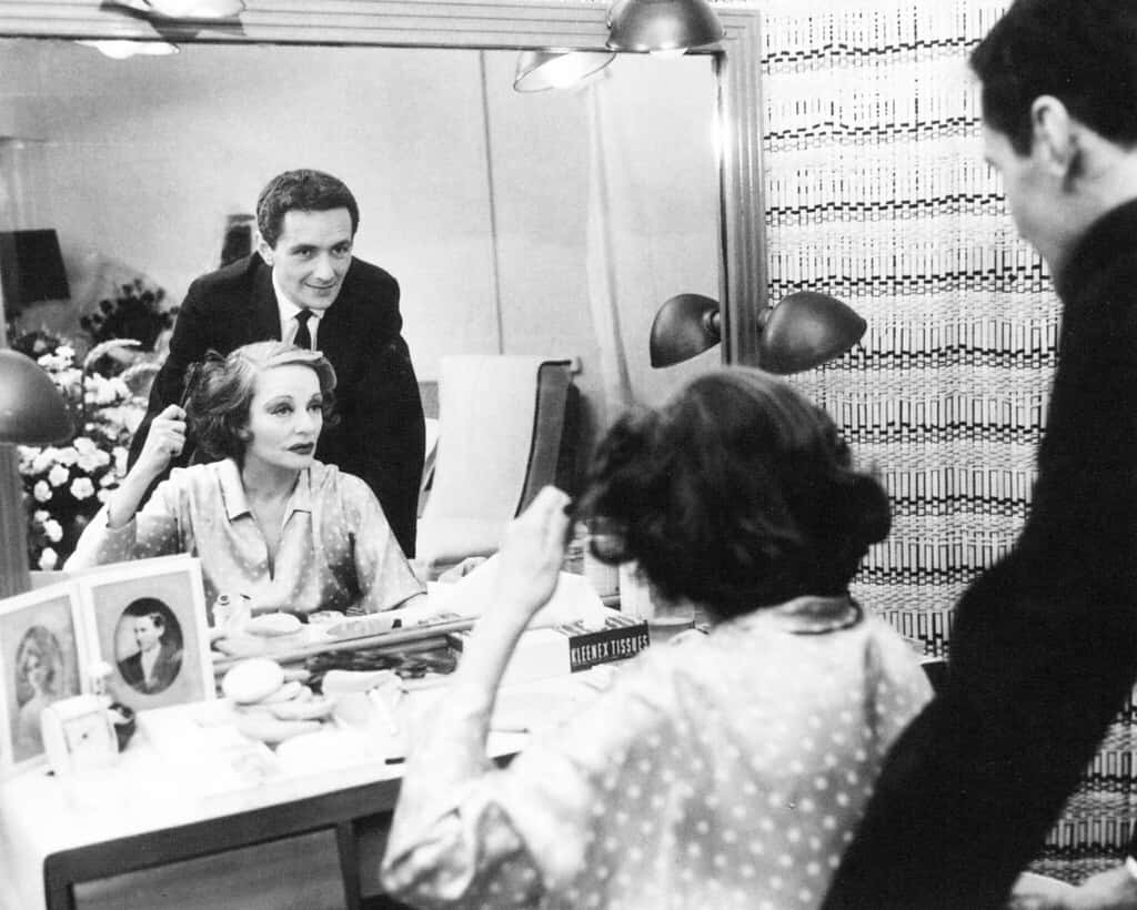 Actress Tallulah Bankhead seated at dressing room