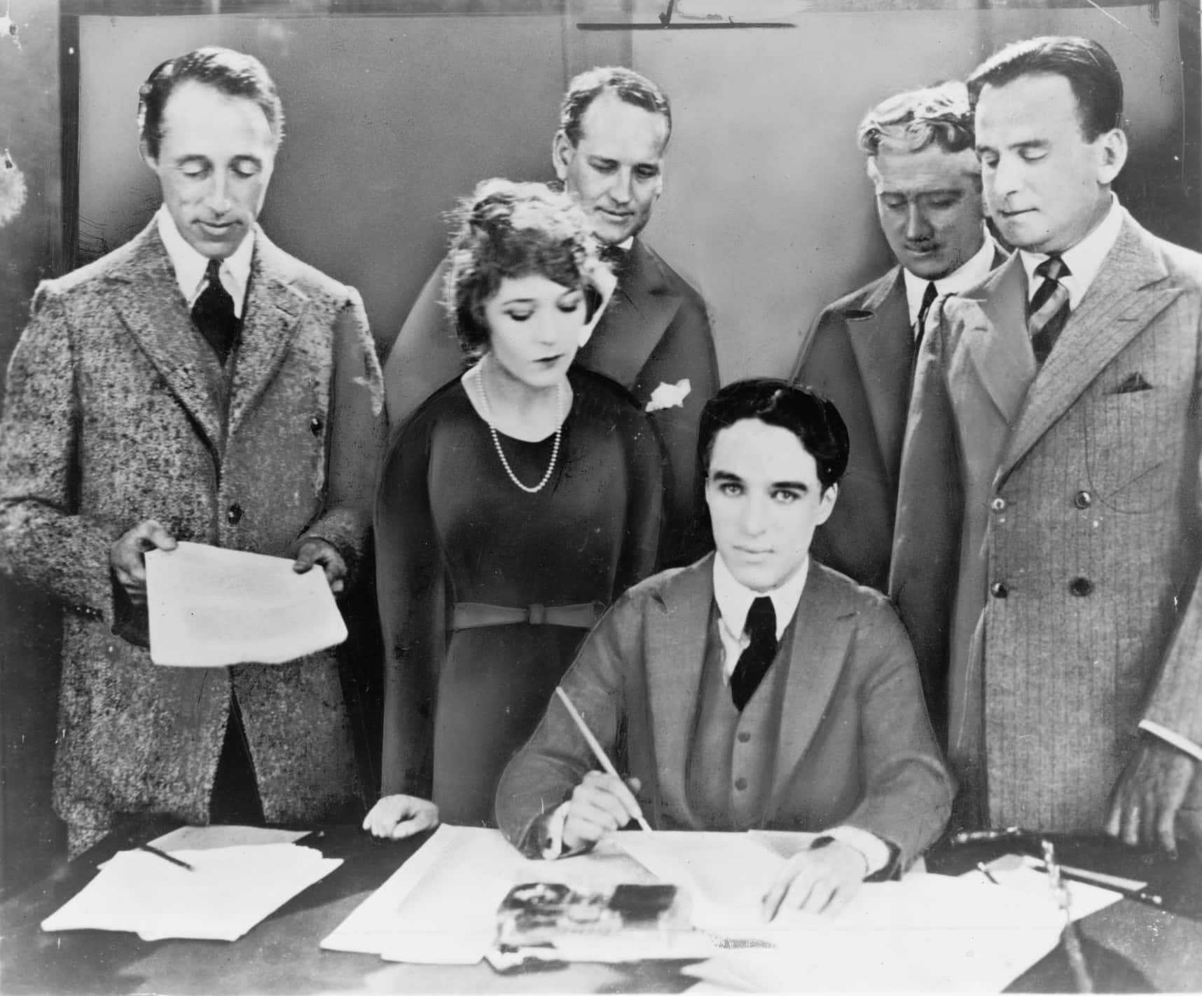 D.W. Griffith, Mary Pickford, Charlie Chaplin signing of the contract establishing United Artists motion picture studio