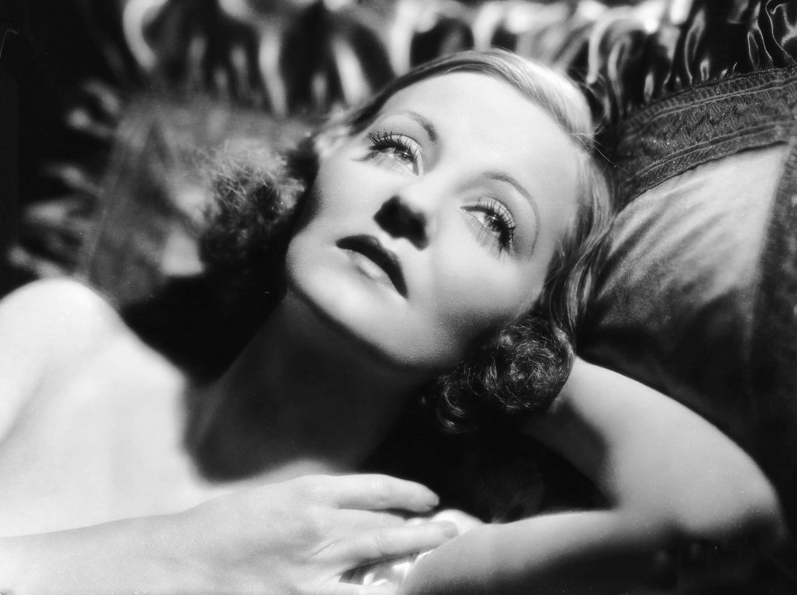 Tallulah Bankhead posing in bed