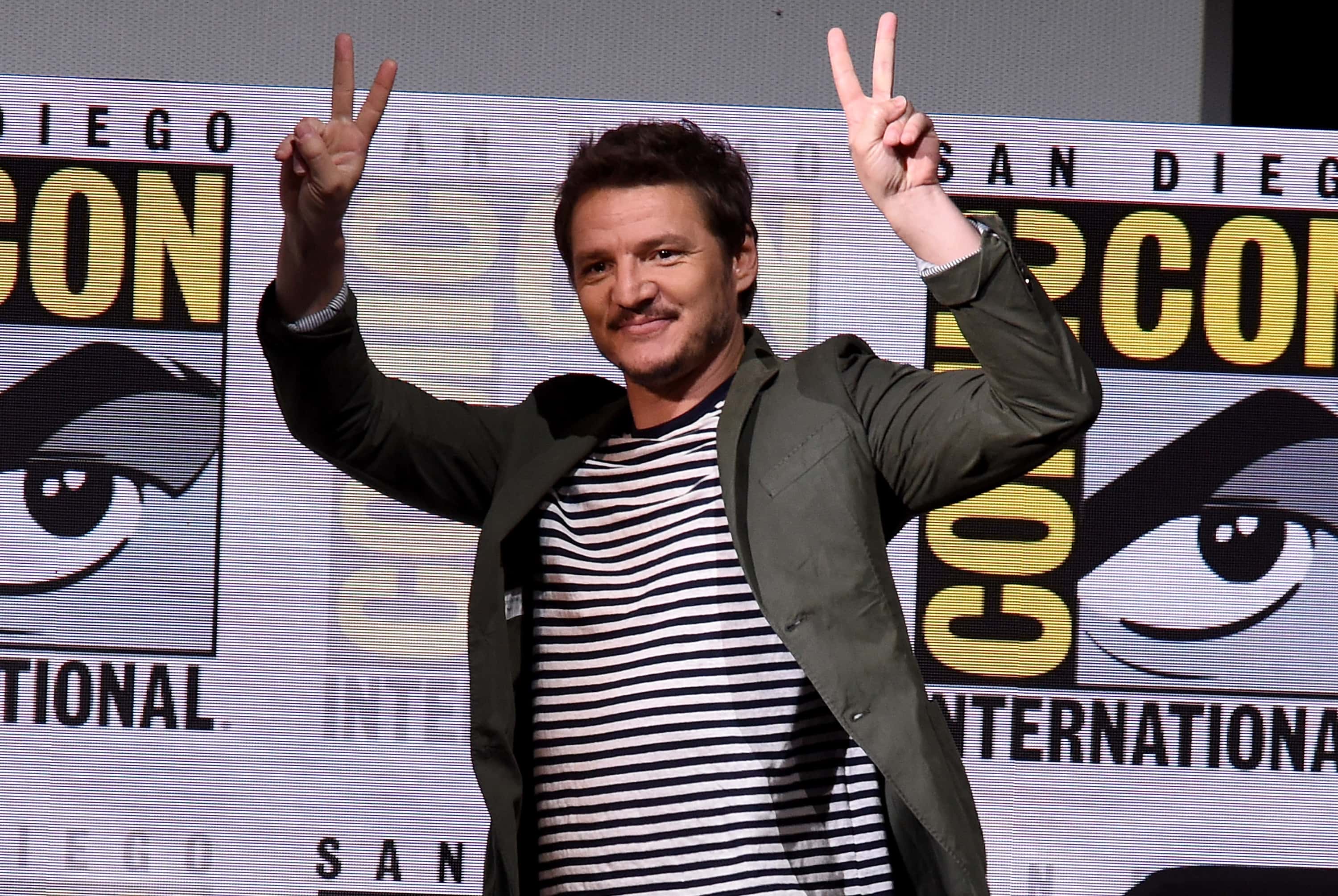 Actor Pedro Pascal walks onstage