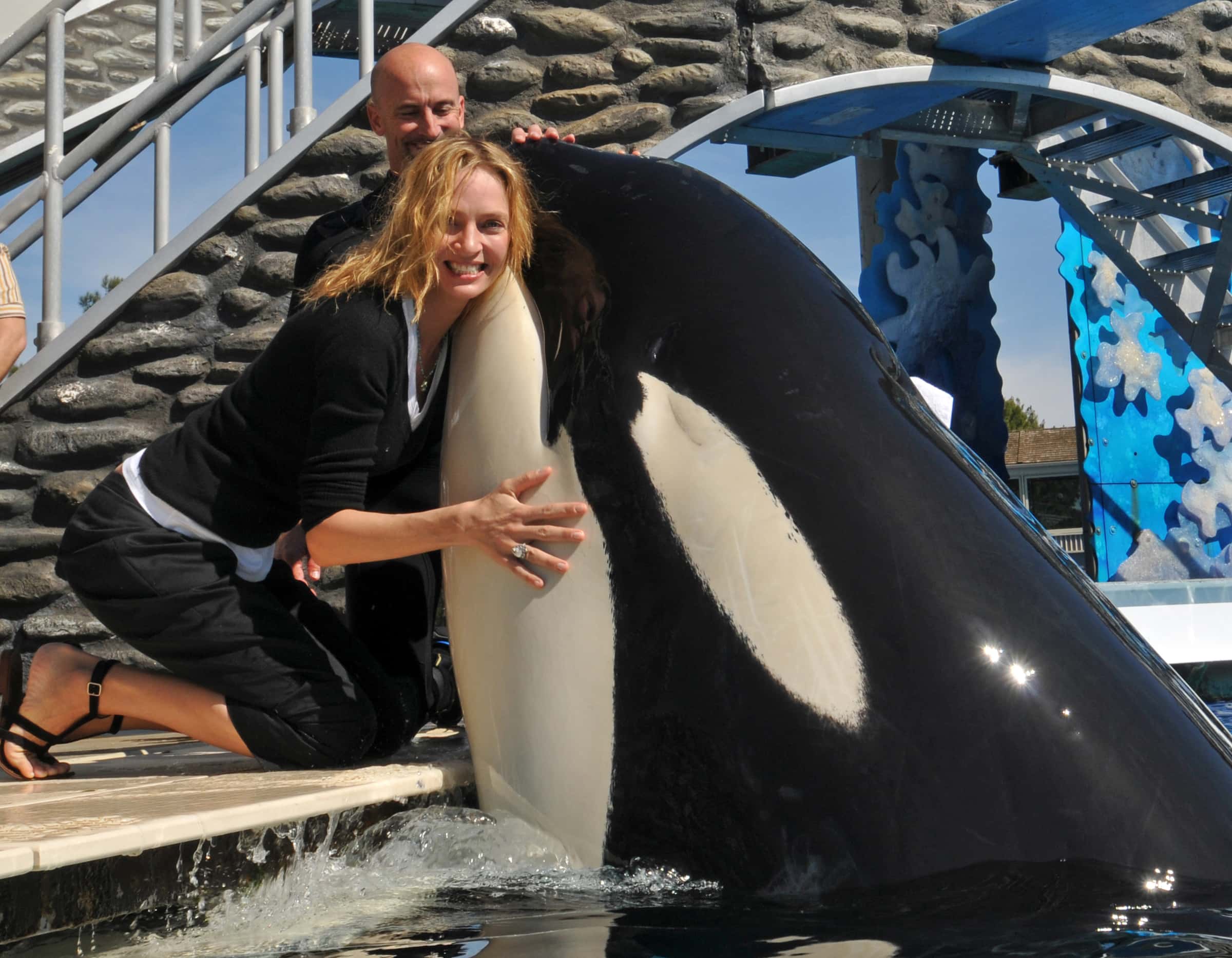 Uma Thurman hugs killer whale