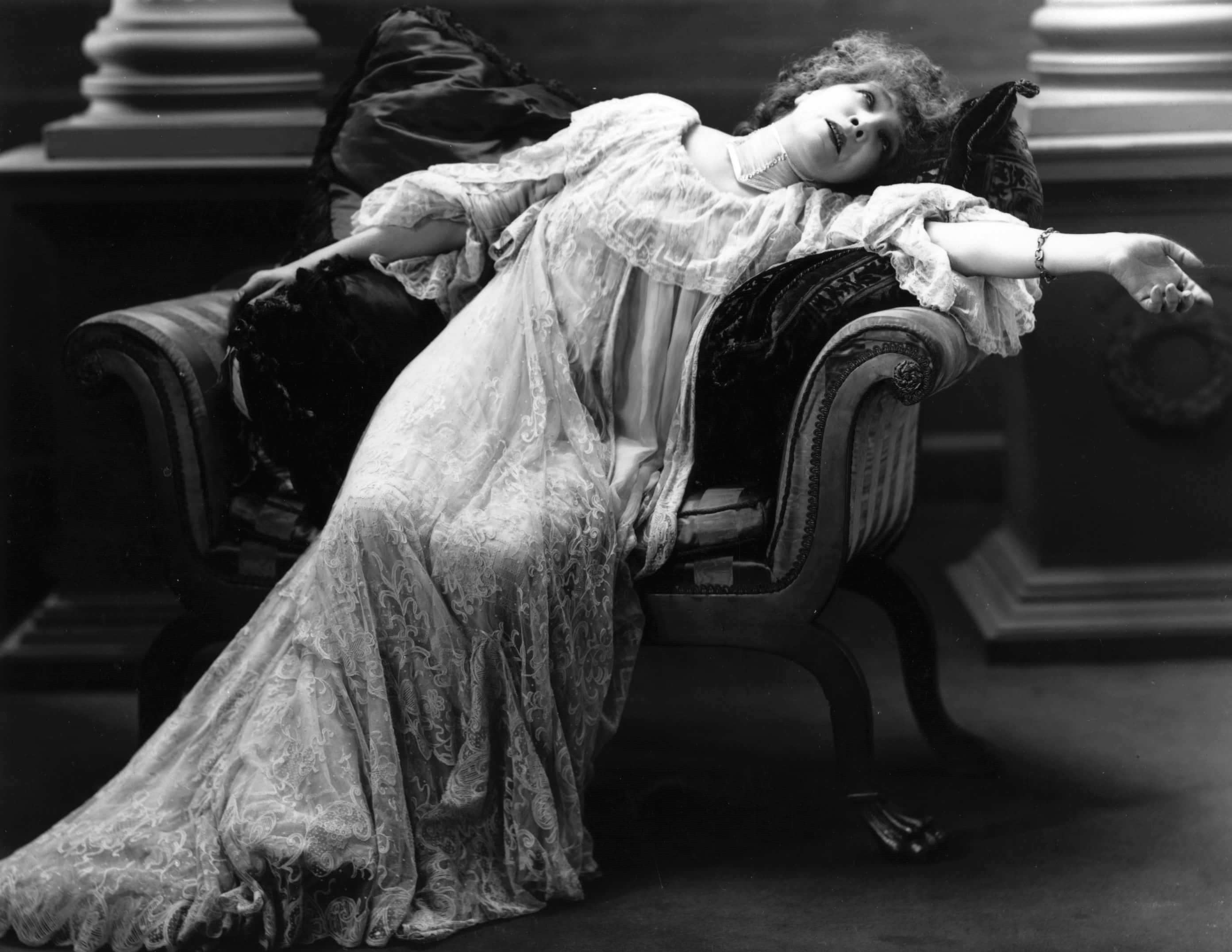 Sarah Bernhardt lying on an armchair 