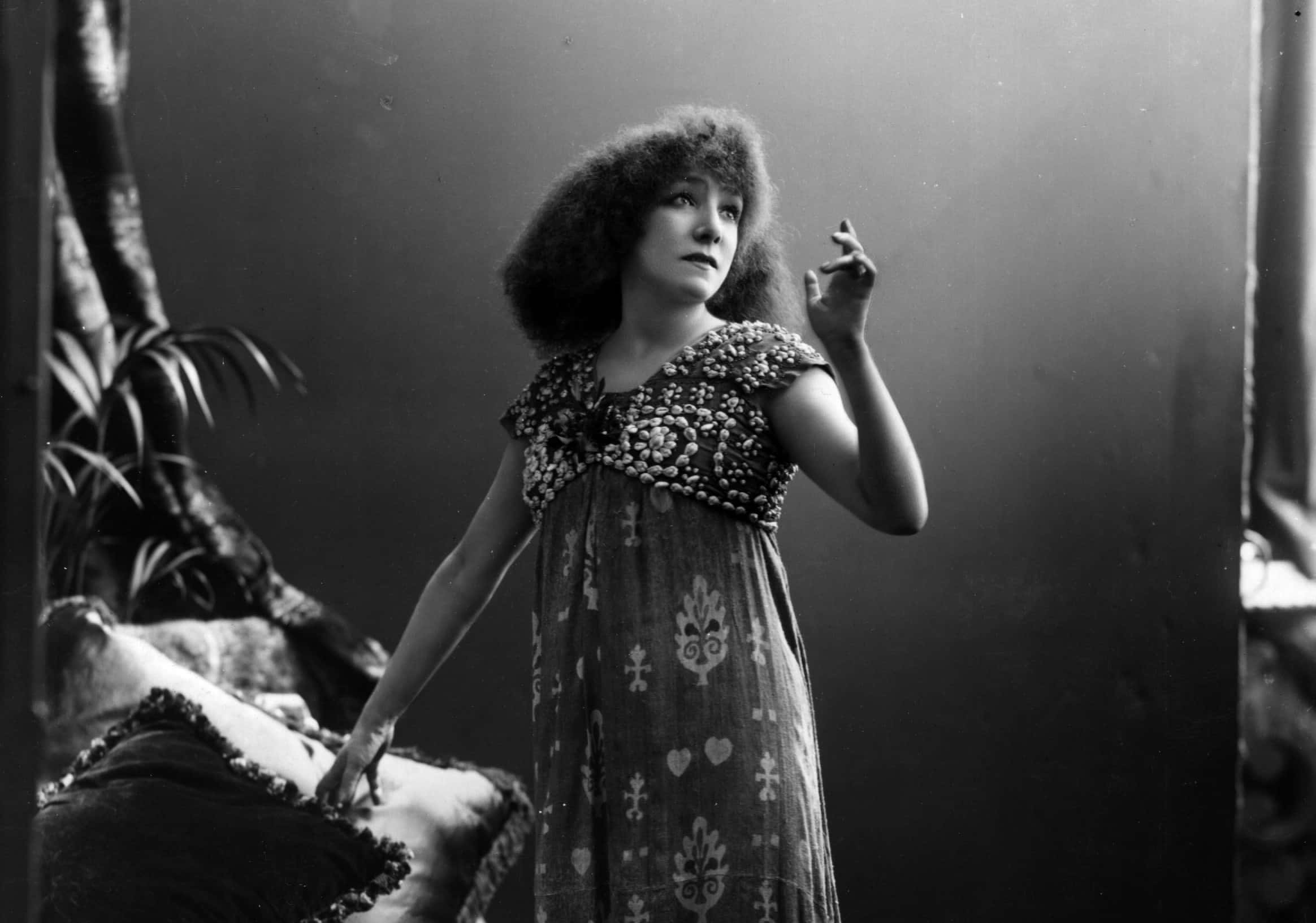 Sarah Bernhardt in colorful  dress 