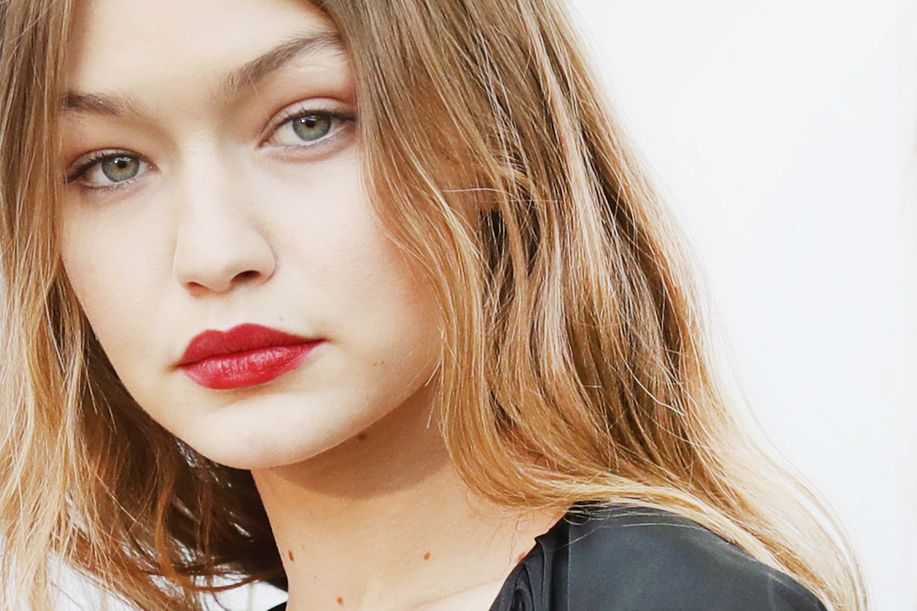 Model Gigi Hadid poses backstage
